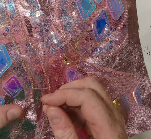 Lil hand sewing on this metallic vest. It really is fit for a princess!
#rodeoqueen #leathercraft #sequins
