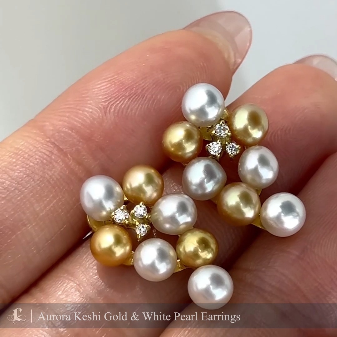 These captivating earrings feature luminous Aurora Keshi pearls in radiant gold and classic white hues. Known for their natural, nucleation-free formation, Keshi pearls boast a unique organic shape and exceptional luster. The cluster design is accented with delicate diamond details, adding a touch of brilliance to the pearls’ natural beauty. Perfect for those seeking a sophisticated yet artistic statement piece, these earrings exude elegance and charm, suitable for any occasion.
#keshipearlearrings
#keshipearljewelry