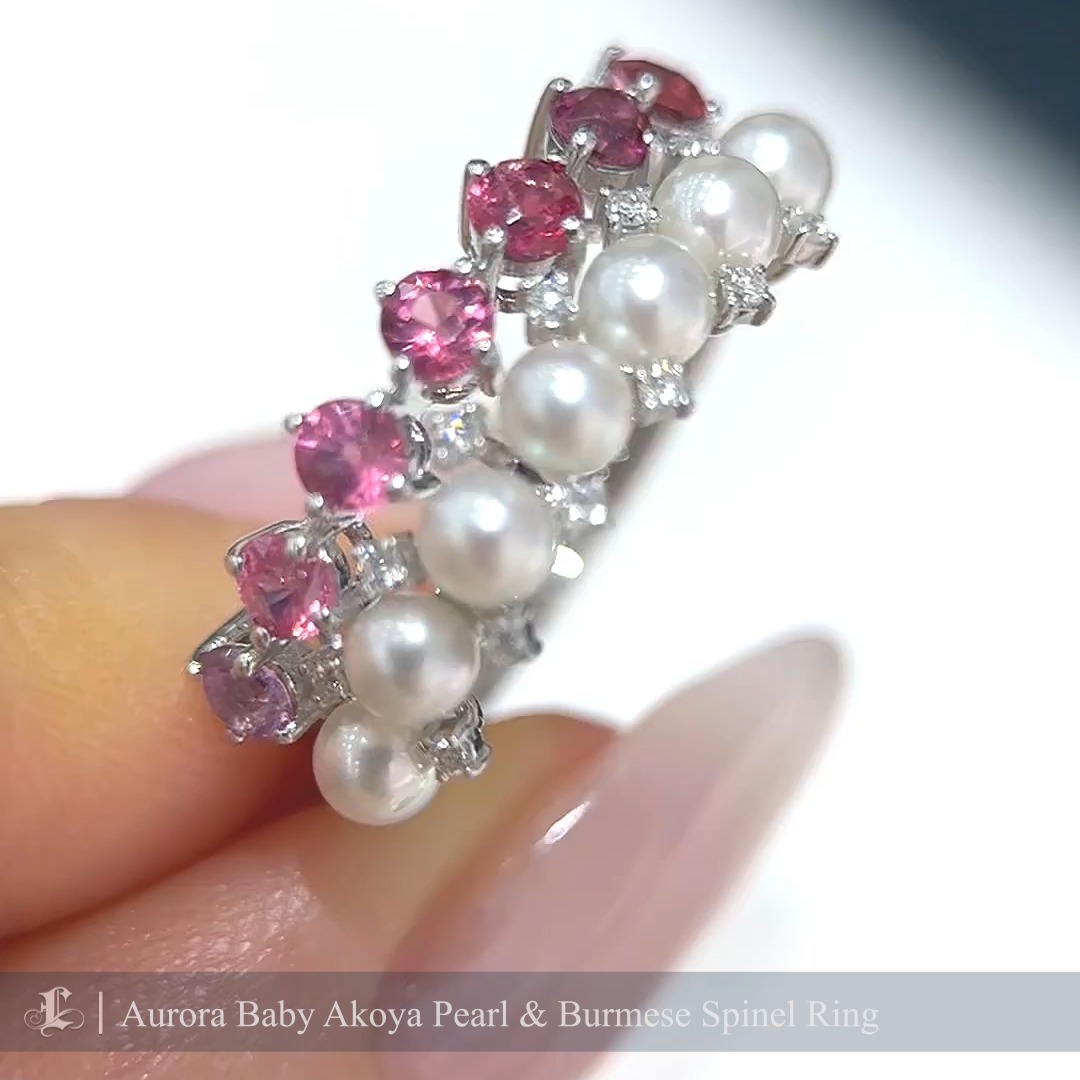 This elegant band ring features luminous Aurora Akoya pearls, perfectly complemented by vibrant Burmese spinels in shades of pink and purple. The pearls’ radiant luster harmonizes beautifully with the natural diamond sparkle accentuating the design. Crafted in 18K white gold, this ring is a sophisticated blend of timeless elegance and modern charm, making it a standout piece for special occasions and everyday luxury.
#akoyapearlring
#spineljewelry #spinelring