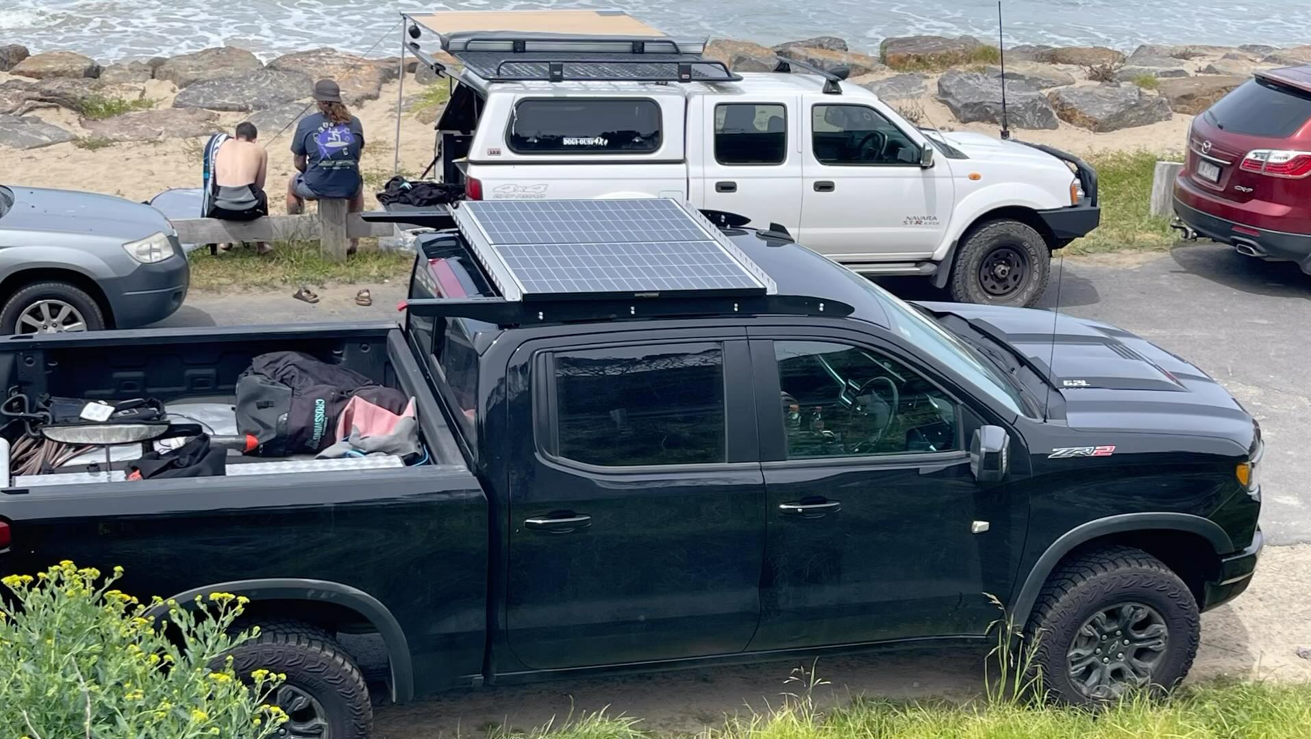 Tough Touring has manufactured Solar panel roof racks for most popular 4wd vehicles... they can carry up to 600w of solar power on larger models.