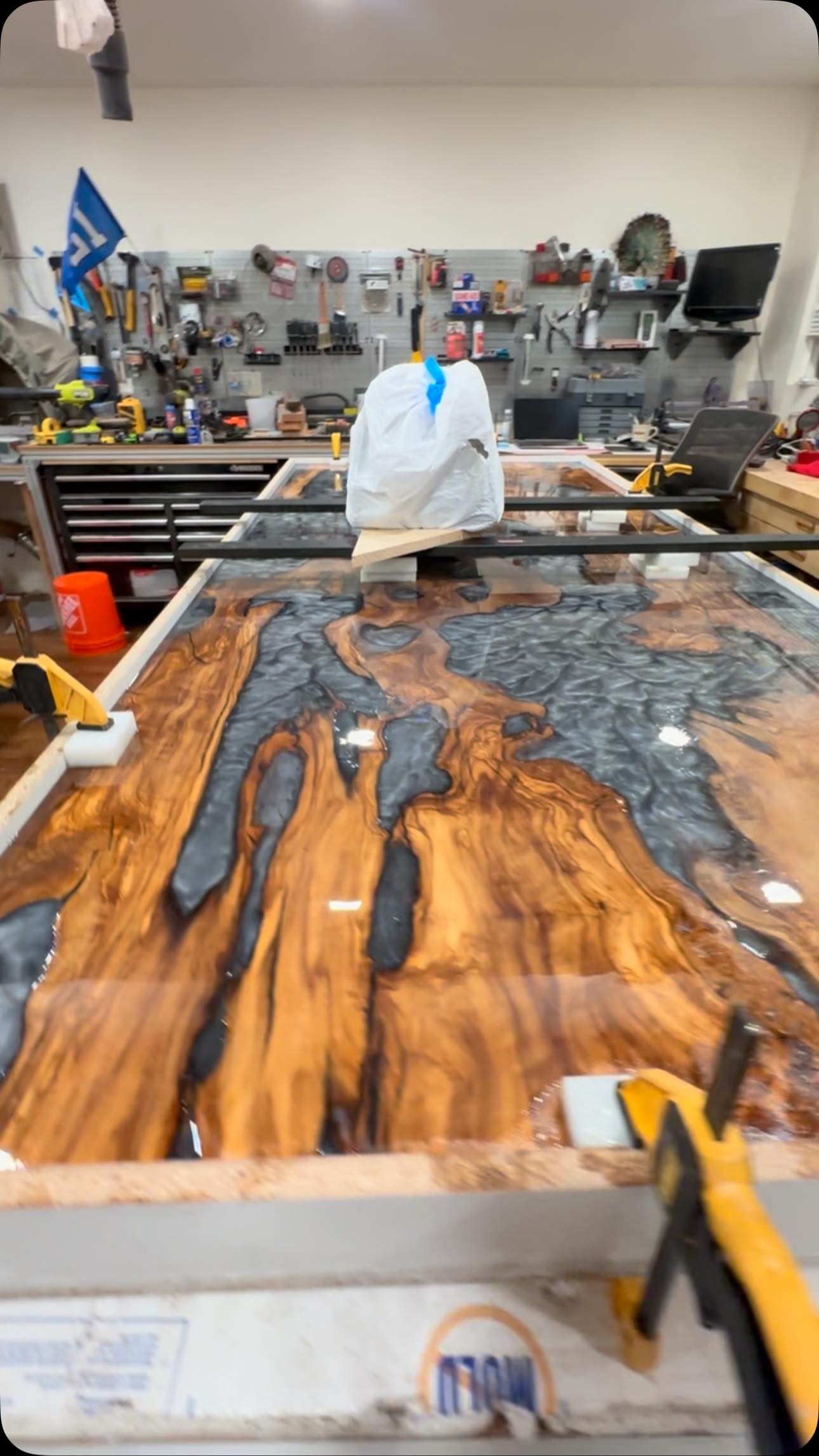 Live edge olive and resin dining table in progress.