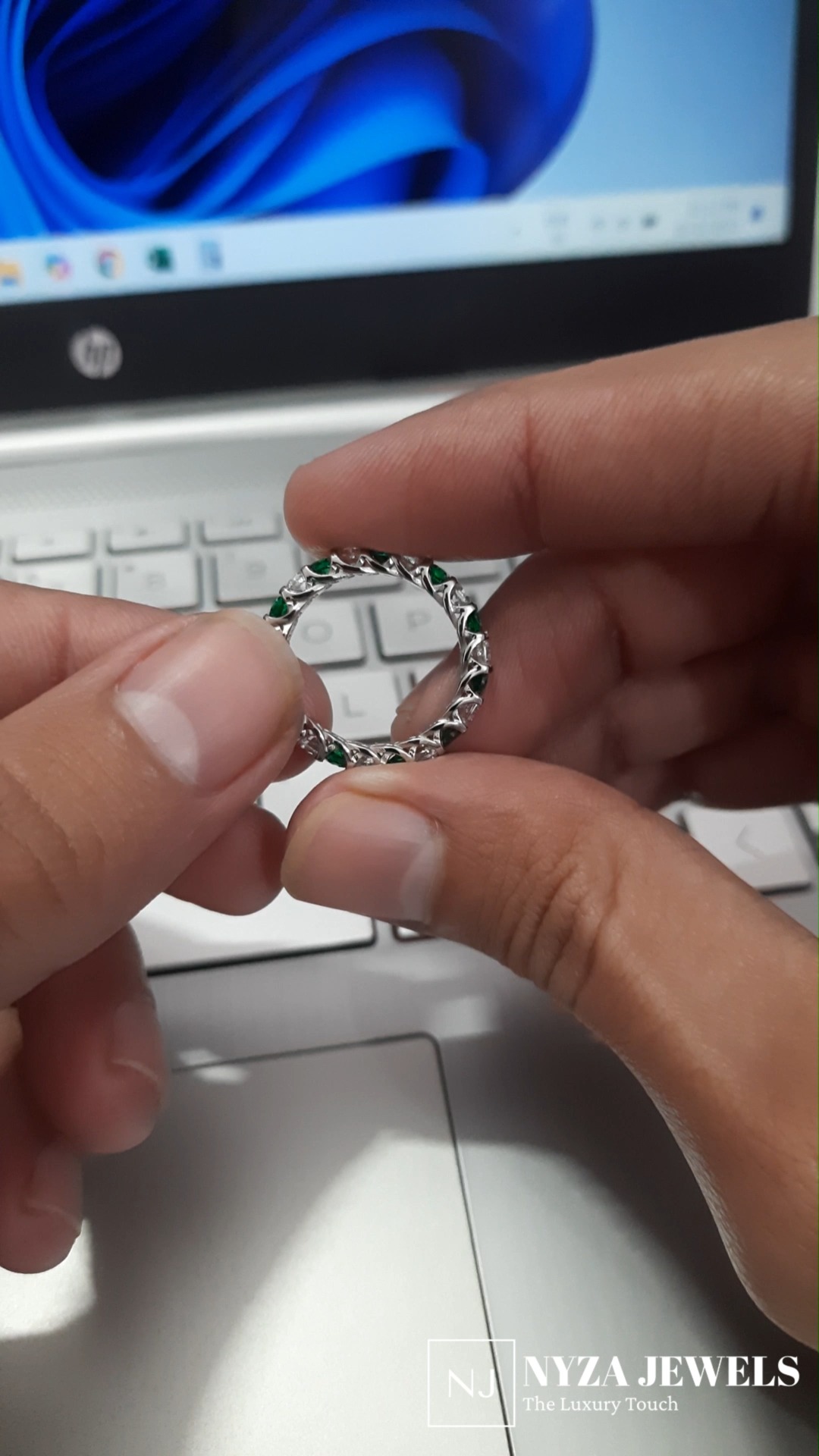 "Enchanting elegance in every glance ✨
💚 Our stunning emerald wedding band shines with timeless beauty and a hint of nature's grace. Perfect for celebrating your love story, this piece captures the essence of romance with every sparkle. 💍 #EmeraldLove #WeddingBand #EternalElegance"