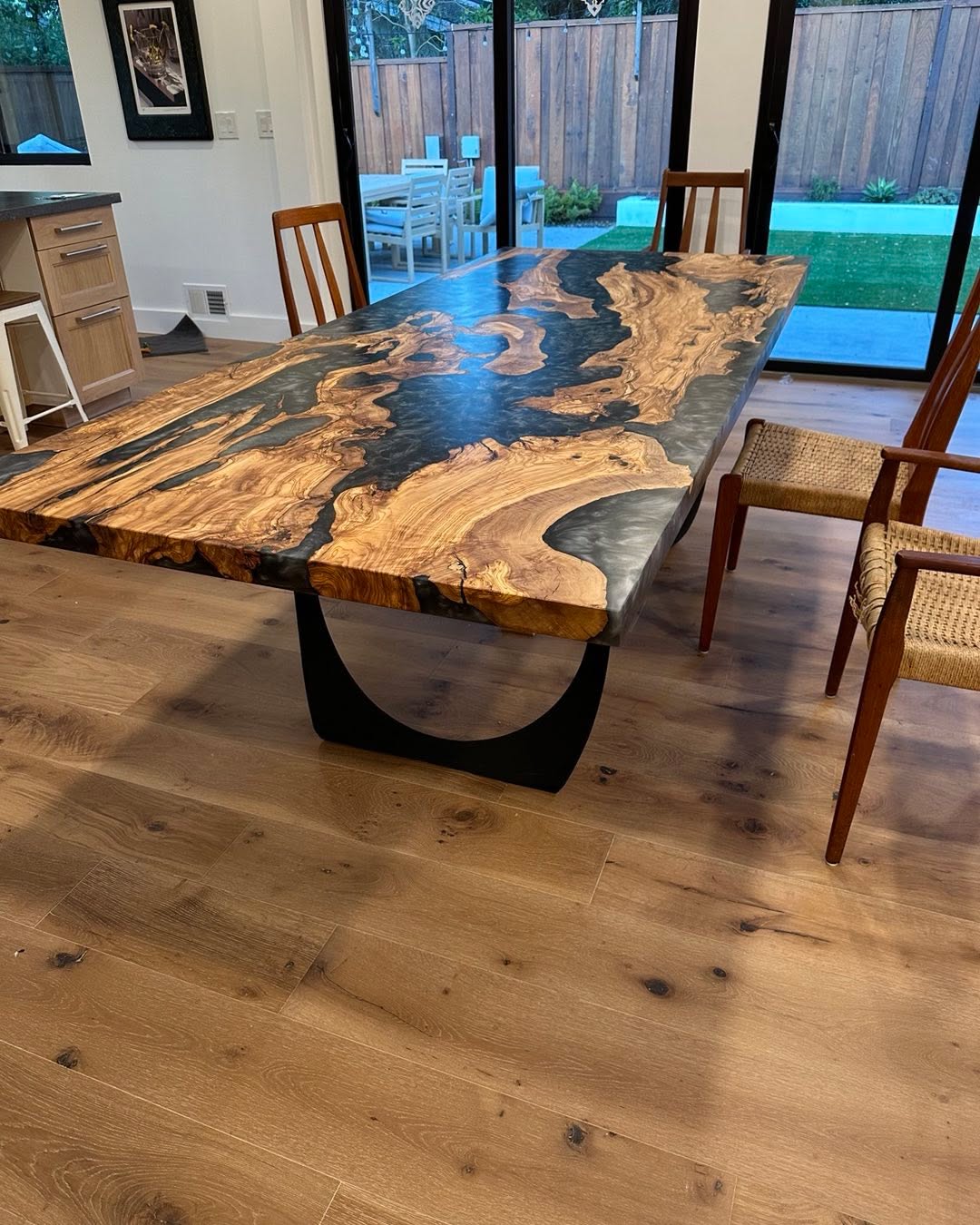 New live edge olive and resin dining table found a new home in Pebble Beach CA.