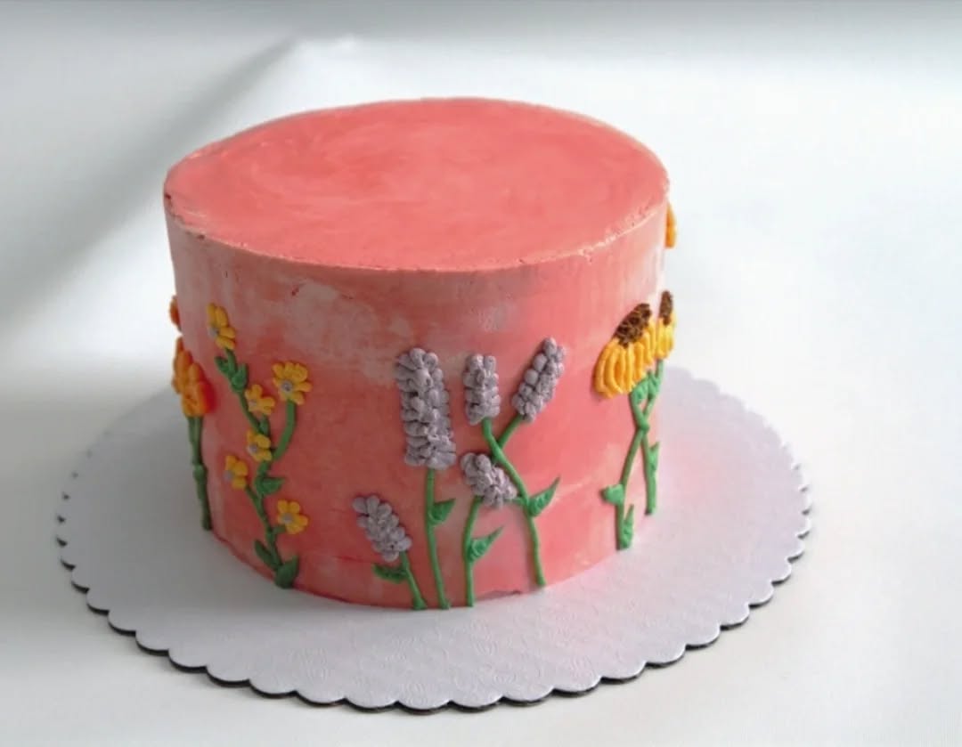 A sunny day calls for a sunny cake. This one was made for a birthday party last month and featured a pink base with florals piped along the side, including lavender and black-eyed Susans.
#pinkcake #floralcake #buttercream #twincities #mpls #stp #localbaker #botanicalcake #birthdaycake