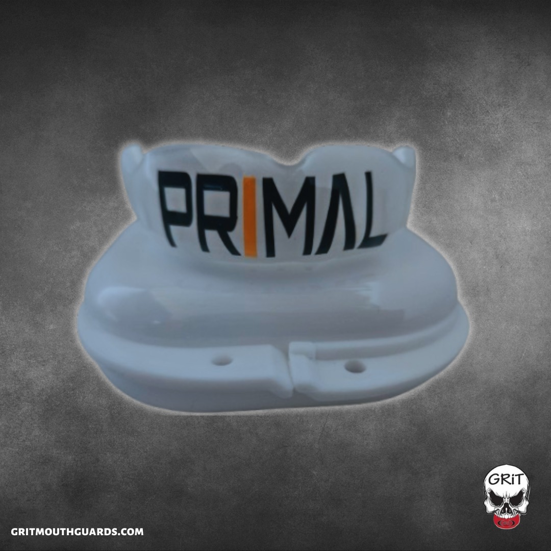 New! A custom mouthguard design created for one of the athletes at Primal MKE. Designed to withstand the toughness of mma, this mouthguard is solid white with PRIMAL written across the front using black and yellow bold font.
What's your design? Create it at www.gritmouthguards.com.