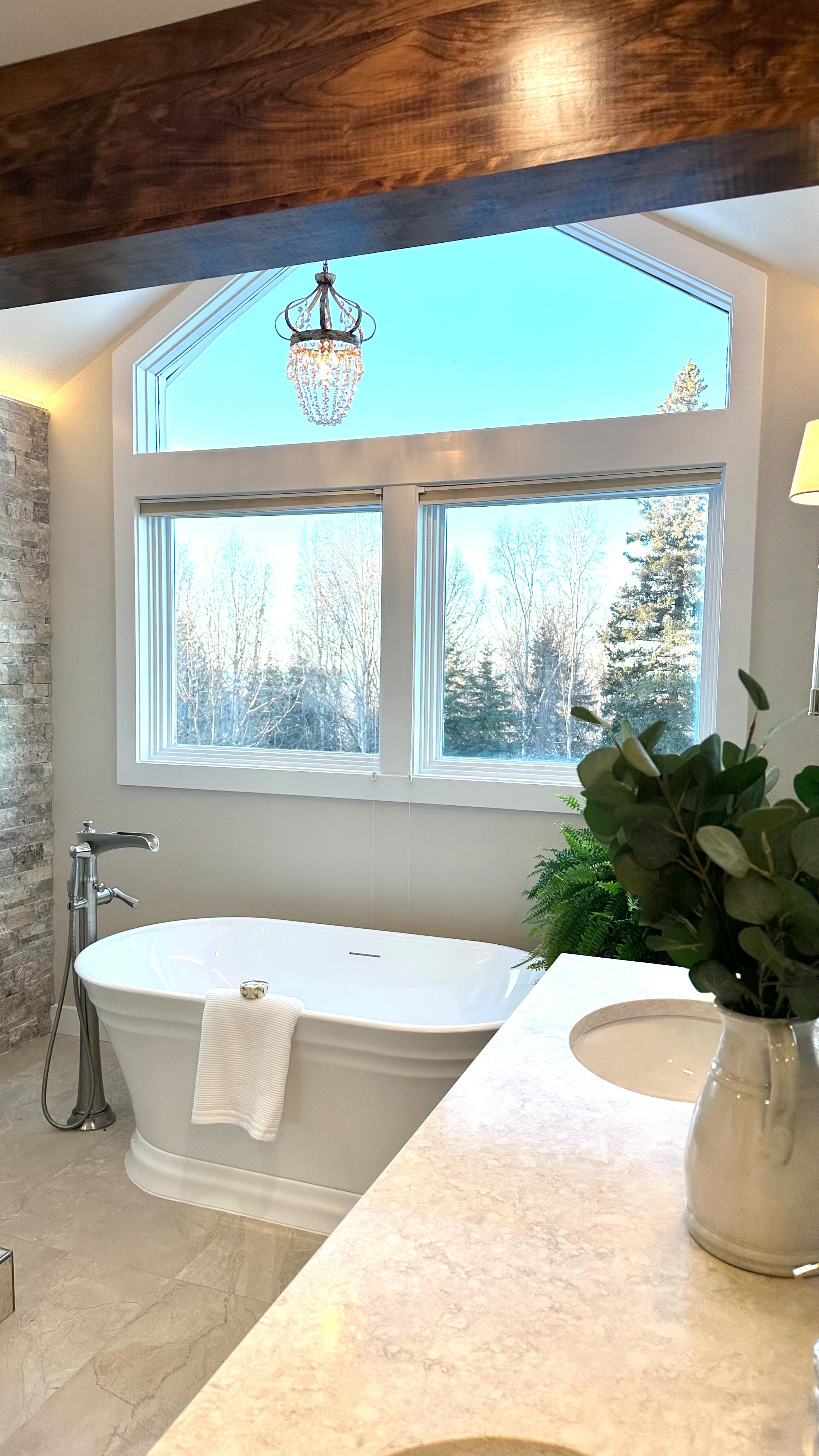 ✨ Excited to share our latest bathroom remodel that beautifully blends timeless elegance with Tuscan influences! This stunning space features a custom vanity, a luxurious soaker tub with a waterfall filler, and a spacious walk-in shower, all enhanced by exquisite stone work and rustic wood beam. One of the standout elements of this project is the captivating atmosphere created through the lighting design—from the soft glow of strip lighting washing over the ceiling to the enchanting chandelier framed by large picture windows showcasing serene forest views.
Contractor: @DandronConstruction
Lighting Install: @ntsalaskallc
🛁🌲
#InteriorDesign #BathroomRemodel #TimelessDesign #TuscanStyle #alaskahomes #alaskainteriordesign #anchorageinteriordesign