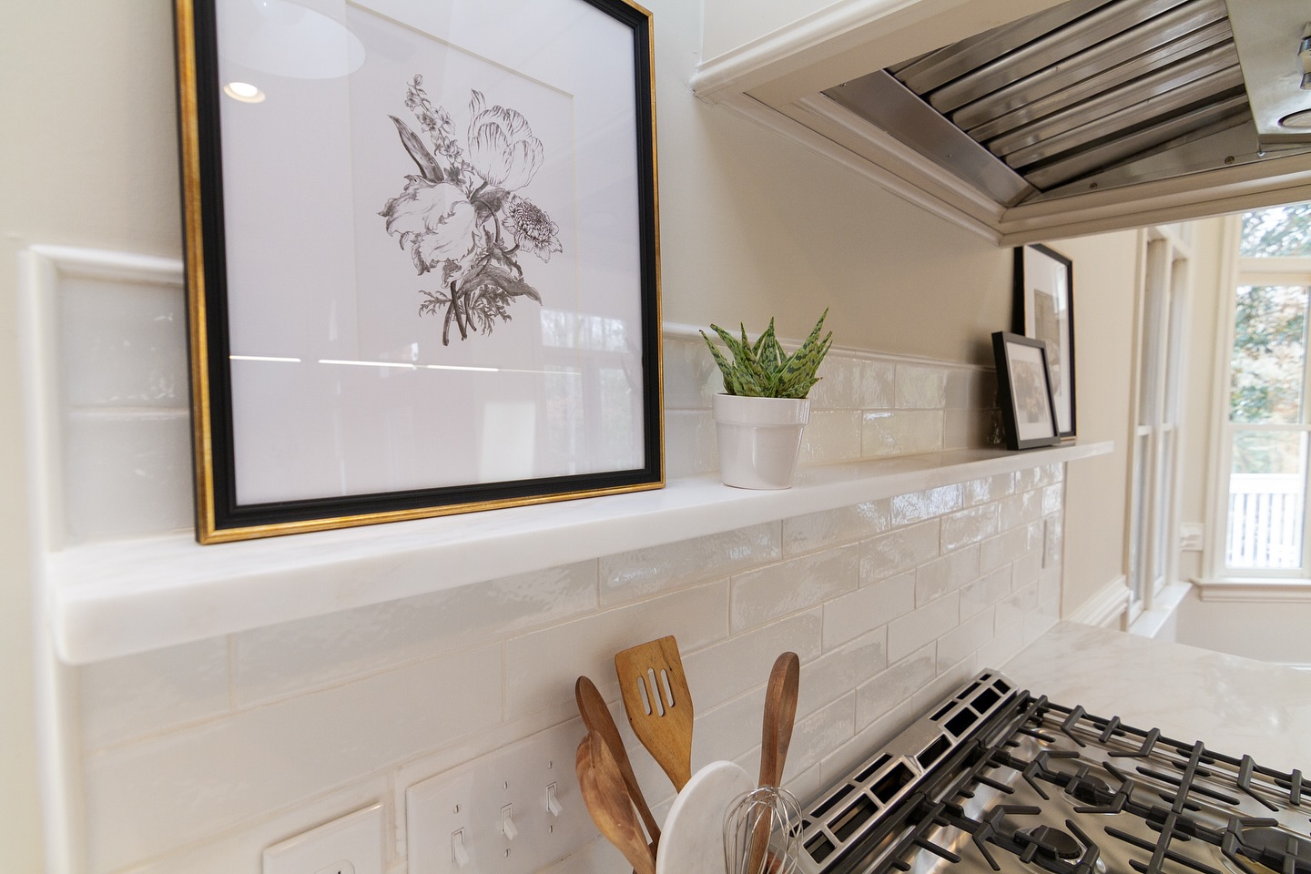 Looking for homeowners in Raleigh NC who want a luxury kitchen this spring or summer!
This started as a dark kitchen that felt small despite the 10 foot ceilings and open floor plan.
As soon as we chose a lighter shade of cabinets and brought in a beautiful Calacatta Marble for countertops, it immediately felt four times more open.
We replaced a heavy, clunky range hood with something more subtle and classic, flanked with brass tasks lights that are both functional and beautiful.
Our favorite part might be the small shelf over the stove, perfect for a stylish salt cellar and pepper grinder.
And I think that’s what we attempt to accomplish in every kitchen— make it functional for your family and reflect your style.
Reach out today if you’re looking to update your kitchen. We would love to schedule a call and help make your dreams a reality.