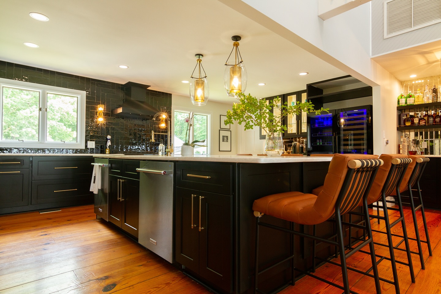 Here are 3 things we would do in our own kitchen that we loved about this one…
1. Double dishwashers really makes entertaining large crowds so much easier! This family hosts huge crowds at their lake home most weekends through the summer. Tons of kids, lots of hungry adults make for endless loads of dishes. This does the trick!
2. HUGE island. This really fulfilled several items on the wish list. More storage, more prep space, and lots of room for people to sit around and gather while food is being prepared.
3. Double oven. I mean, we love to host people at our home and if you go home hungry, it’s your own fault! Doubling the ability to roast veggies, bake brownies, and bake a steak before searing on the grill (our favorite way to cook a delicious steak!) really gives you more freedom to be with your guests and family.
What’s your favorite part?
We help people in the Raleigh area design and build beautiful and functional kitchens. If this describes you, shoot us a DM and we will schedule a consult to see how we can help being your kitchen goals into reality!