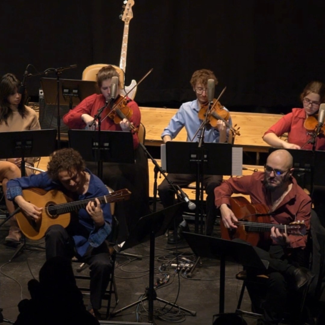 With my long-time friend Adam Del Monte playing at the Krannert Center for the Performing Arts last December as part of his week-long residency with the Latin American Ensemble and my guitar studio.
Here's Adam pushing me to the limits of what my non-flamenco fingers can do! :)