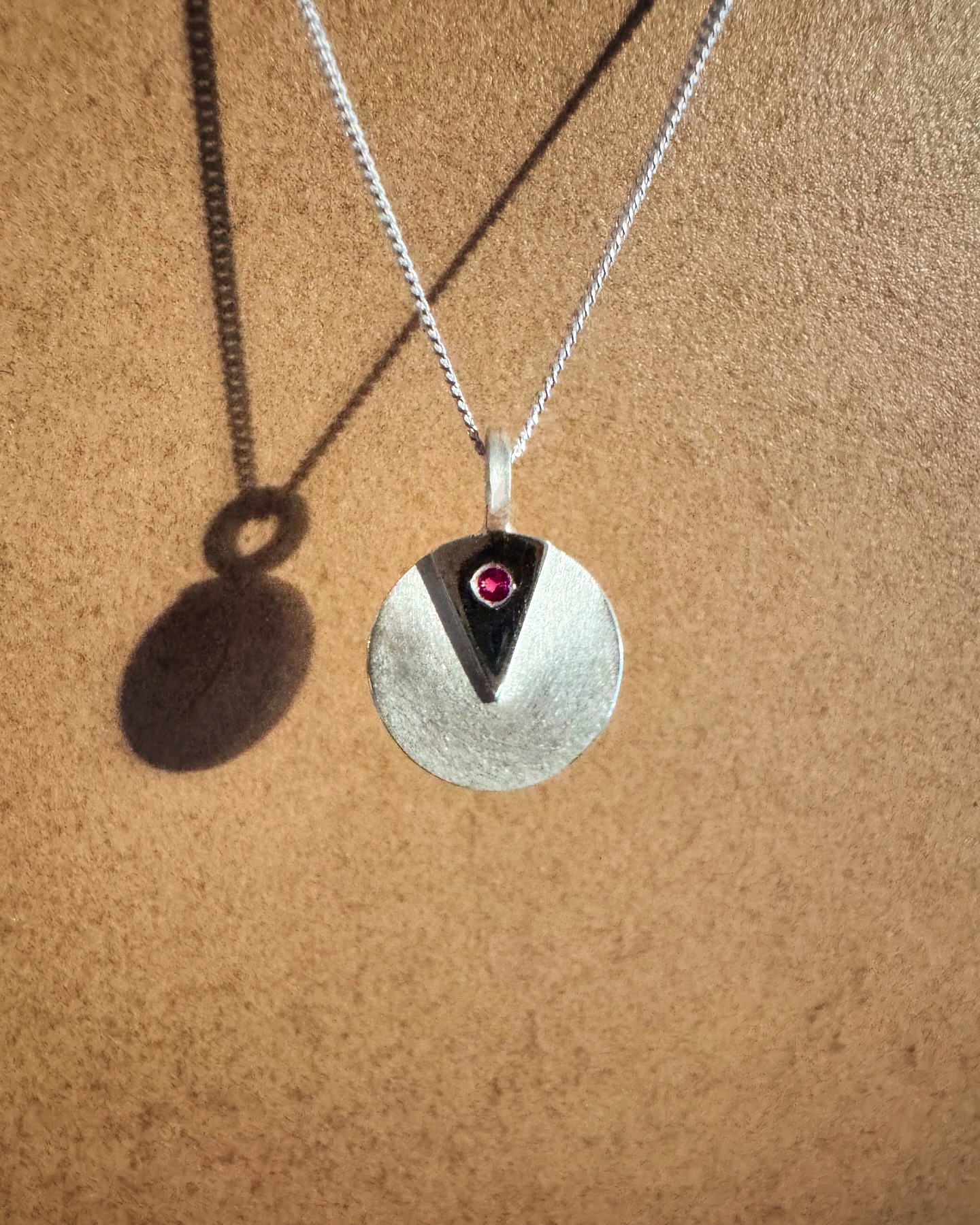 “People who flourish are happy and satisfied; they tend to see their lives as having a purpose; they are optimistic, they have a degree of mastery and accept all parts of themselves”
Corey Keyes
- That’s my Mum and Dad!
This was a special one - a commission for my Dad to gift to my mum for their 40th wedding anniversary.
We decided to set a little ruby in the pendant to commemorate this special anniversary.
Do you love the idea of modern sentimental jewellery - pieces that tell a story without being overly traditional? I’d love to know your thoughts!
I’m not taking on new commissions just now as I head off on maternity leave, but I’ll still be checking mailboxes so feel free to get in touch with any enquiries and I’ll get back to you as quickly as I can.
You can still explore my collection of one-of-a-kind pieces 🔗link in bio.
#modernsentimentaljewellery #personaljewels #meaningfuljewellery #modernheirloom #40thanniversary #rubyanniversary #rubyweddinganniversary #customjewels #familygifts #familyheirloom #futureheirlooms #anniversarygift #rubyjewellery #uniquejewellery #bespokejewellery #oneofakindpieces #timelessjewels #jewellerydesign #ethicaljewellery #jewelrythatmatters #flourishing #handcraftedjewellery #craftedwithlove #heirloomjewels #specialoccasiongifts #mothersgifts #maternityleave