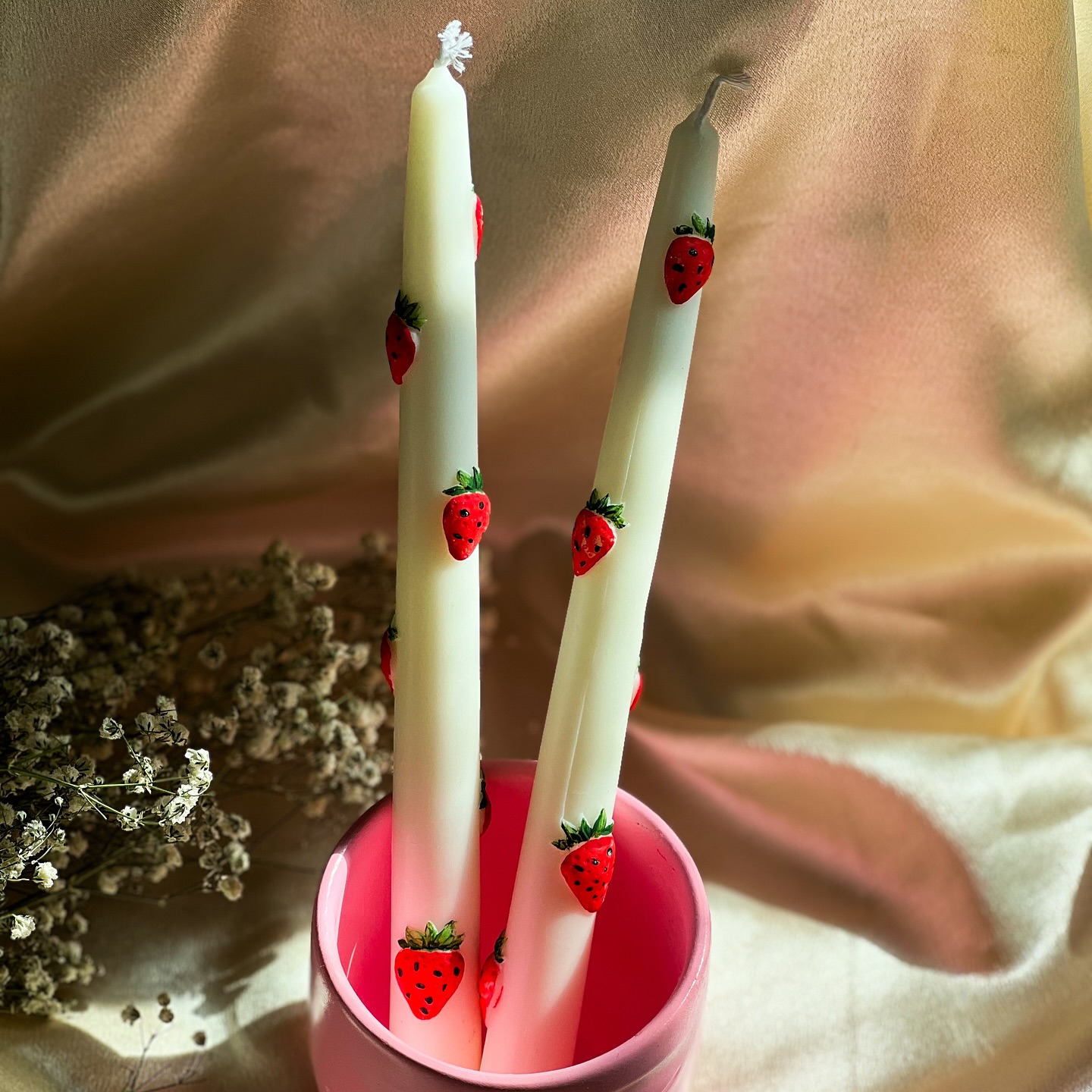 Elegant taper candles featuring hand-painted strawberries — a charming blend of rustic romance and delicate detail, perfect for summer tablescapes, garden weddings, or cottagecore home decor.
agaboocandle.com