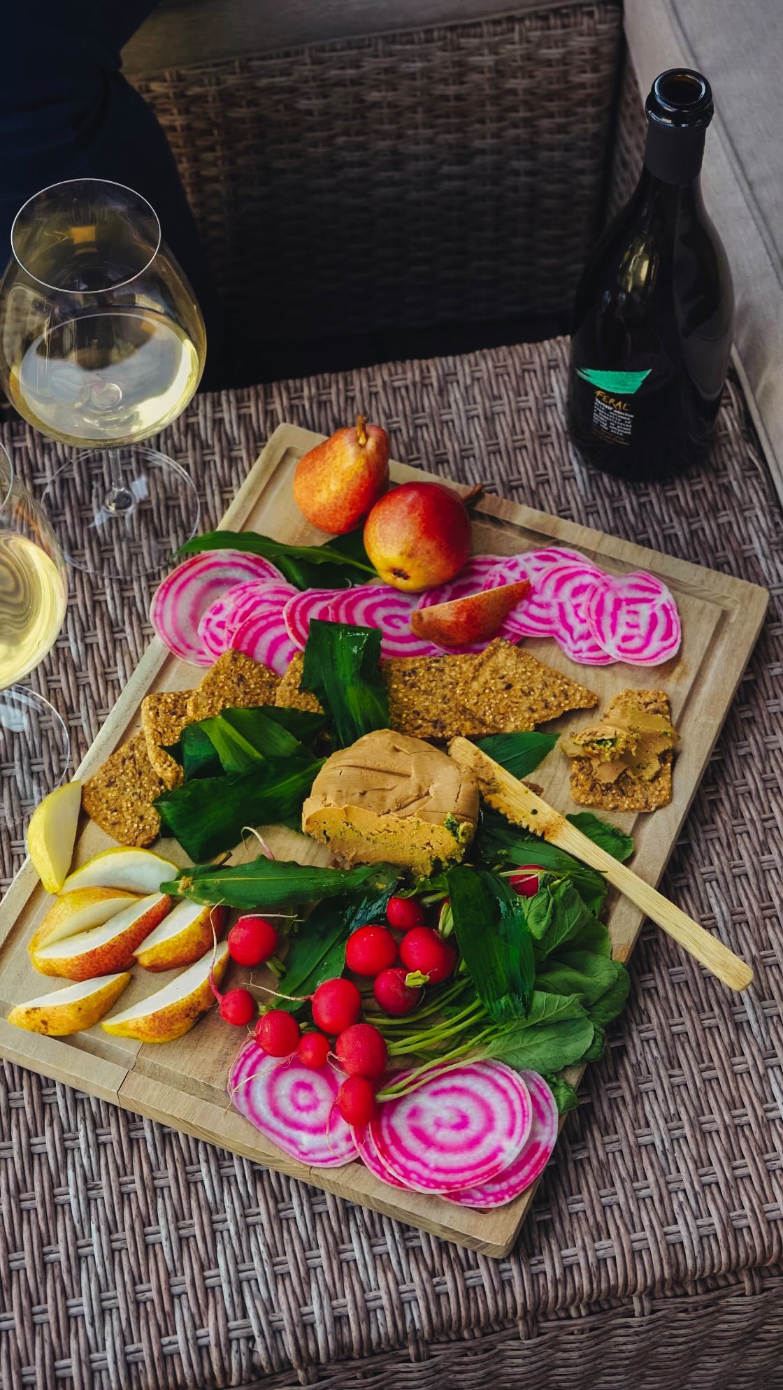 It’s officially balcony season, and Rasmus and I are kicking it off with homemade cashew cheese swirled with wild garlic pesto—🌿 foraged straight from the local forest. We paired it with @feral_drinks dreamy 0% alc fermented sip infused with botanicals and a hint of Szechuan pepper ✨The base is made from beets, which also happen to be Bingo’s new favorite snack…💗
🧀 Cashew Cheese Wheel with Wild Garlic Pesto
• 135g (1 cup) raw cashews, boiled for 10 minutes or soaked overnight in the fridge then drained
• 2 tablespoons neutral (refined) coconut oil
• 1 tablespoon lemon juice
• 1 tablespoon miso (I used smoked miso, but feel free to use white miso for a lighter cheese color)
• 1 tablespoon water
• 2 tablespoons nutritional yeast
• 1/4-1/2 teaspoon salt (depending on your miso)
• 2 tablespoons wild garlic pesto (recipe below)
• A few leaves of wild garlic (to wrap in)
1. In a food processor or high-speed blender, blend the first 7 ingredients until smooth. You may need to scrape the sides in between blending.
2. Line a mini ramekin or springform with some wild garlic leaves, making sure to overhang them so they will cover the cheese. Fill the ramekin/springform 3/4 the way with the cashew cheese mixture, then swirl in two tablespoons of pesto. Then, spread the remaining cashew cheese mixture on top. This is so the pesto gets “sealed” in. Fold the wild garlic leaves over and place in the fridge to firm up.
🌿 Wild Garlic Pesto
• 50g (1/3 cup) raw, unsalted pumpkin seeds
• 40g (1 1/4 cup, packed) wild garlic
• 2 tablespoons lemon juice
• 1 teaspoon lemon zest
• 100ml (1/3 cup + 1 tablespoon) olive oil
• 2 teaspoons maple syrup
• 1/2 teaspoon salt
• Optional: 2 tablespoons nutritional yeast
1. In a food processor or high-speed blender, blend all ingredients until almost entirely smooth (it’s nice to leave a bit of texture from the pumpkin seeds).
#nonalc #zeroalc #plantbased #plantbasedcheese #vegancheese #homemadevegancheese #cashewcheese #wildgarlic #ramsons #spring #feraldrinks