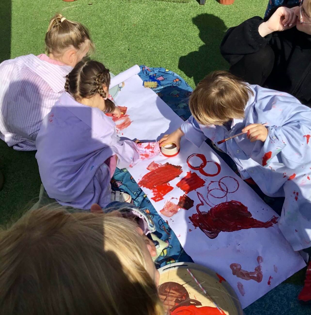 Painting on a large scale encourages the use of bigger muscles in the shoulders and arms, developing gross motor skills, while also promoting fine motor skills through gripping brushes and manipulating paint. 
What better place to enjoy the experience - outdoors 🖌️🪥🧑🏽🎨👩🏻🎨👨🏻🎨 #westbridgford #independent #nursery  #est1988 #underfundedchildcare #ndna #earlyyearseducation  #openendedplay #earlyyears #play #curiosity #letthemplay #outdoors  #learningthroughplay #milliesmark #birthtofivematters #earlyyearsoutdoors #milliesmark  #2025 #april  #keepingchildrensafe #thewhitehousedaynursery
#aweandwonder #spring #largescalepainting