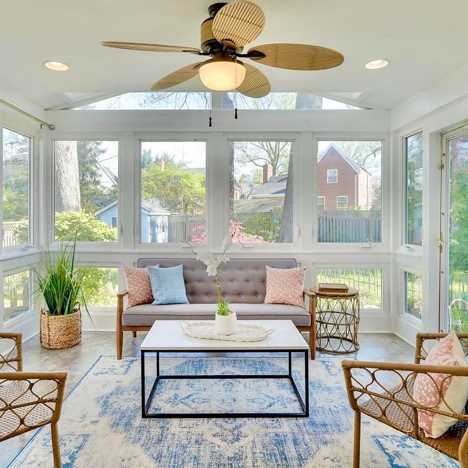 Warmer weather means it’s finally porch time! This one is staged with wicker and pastels alongside a welcoming layout perfect for attracting spring buyers. #vacantstaging #stagingsells #bethesdamdrealestate #compass