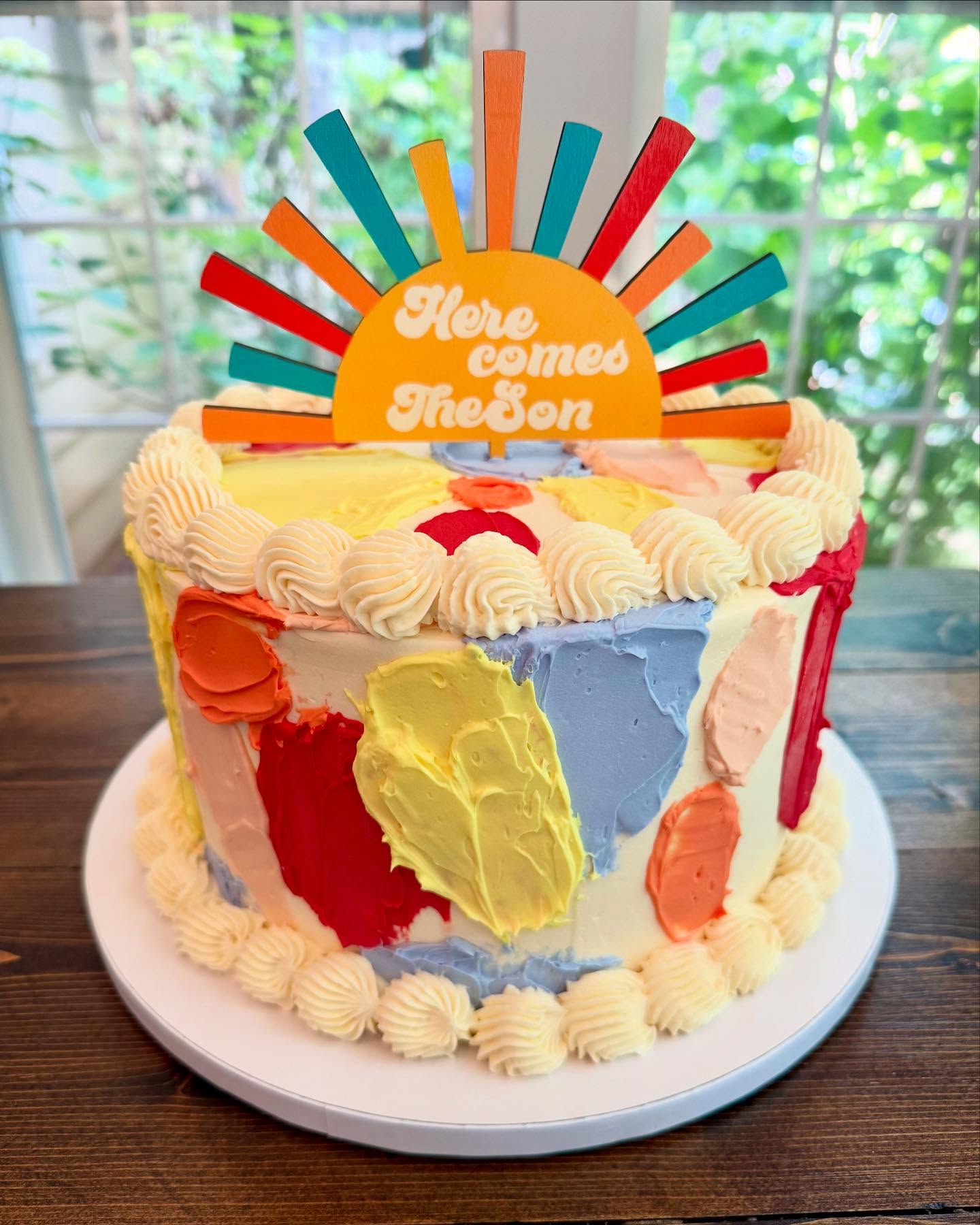 Here Comes the Son!
To celebrate the upcoming arrival of a creative little soul, I made this abstract, Montessori-inspired cake using the palette knife method — bright, bold, and full of life. It’s a tribute to a baby boy already surrounded by beauty, and a mama who is one of the most nurturing women I know.
Sunshine, color, and love — just the way he’s entering the world.
#BakedEdges #MontessoriInspired #PaletteKnifeCake #BabyShowerCake #HereComesTheSon #CreativeCakes #ColorfulBakes #ButtercreamArt