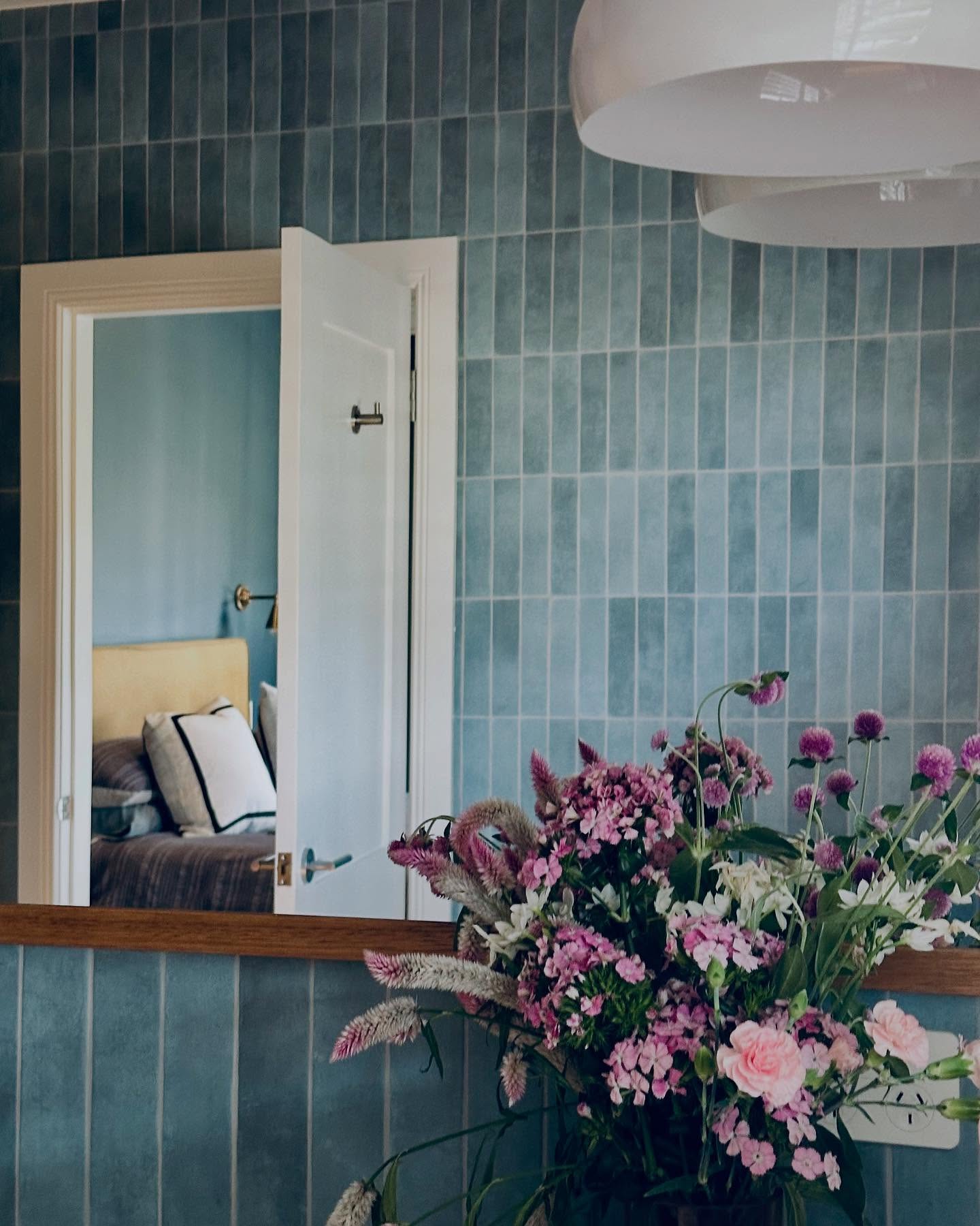 Decorating with blue tiles in the bathroom is like giving the space a deep breath of fresh air. Whether you opt for soft powdery tones or rich navy, blue brings a calming, cleansing quality that suits bathrooms to a tee. It’s a colour that works beautifully with crisp white, warm timber, or even brass accents for a more luxurious feel.
Consider blue mosaic tiles for a splashback, bold patterned floor tiles for impact, or glossy subway tiles to catch the light. If you’re feeling brave, take them halfway up the wall and pair with painted plaster above.
Blue is timeless but never boring—and it’s a clever way to introduce colour without overwhelming the space. Think spa day... every day.
Want help picking the perfect palette for your bathroom? Drop me a line.. I’m here to help.
#SydneyInteriors
#Rickwardesignstudio
#BathroomDesignSydney
#Bathroommakeoversouthernhighlands
#ModernAustralianHomes
#AustralianInteriors
#BathroomInspo
#ElevatedEverydaySpaces
#TimelessDesign
#StudioStyleBathroom
#TileLove
#BathroomRefresh
#FunctionalBathrooms