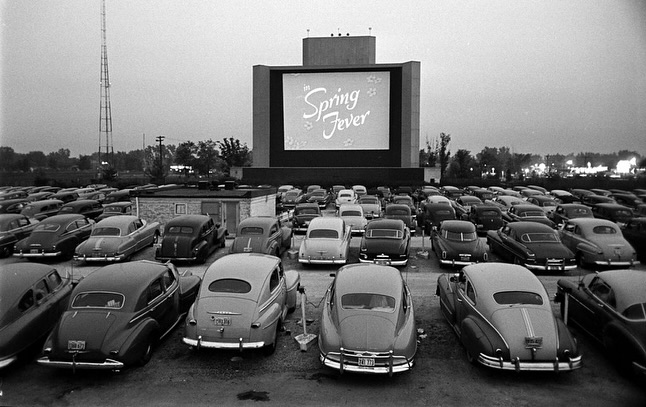 I may not have been around for the heyday of drive-ins, but I remember a few double features when I was young (cartoons first, then a Bond film once my sister and I were asleep in the backseat). The playground, the snacks, my dad hooking up the speaker to the car window, it all felt like magic.
In honor of National Drive-In Movie Day, let’s go back to the first drive-in that opened on June 6, 1933 in Camden, NJ, thanks to Richard Hollingshead Jr., who projected movies from his driveway to create a more comfortable viewing experience. The concept caught on fast and by the 1950s there were over 4,000 drive-ins across the U.S.
More than just a place to watch films, drive-ins were a cornerstone of American culture, shaping dating rituals, family traditions, and even inspiring songs, all under the glow of a giant outdoor screen.
Though their popularity declined in the ’70s with the rise of multiplexes and home video, some drive-ins never left us and new ones popped up again during the pandemic.
Drive-in theaters spread from the U.S. to countries like Canada, Australia, South Africa, and Germany, but none matched the scale or cultural impact seen in mid-century America!
Today’s LH Discovery 💡
Drive-ins still going strong include:
• Bengies Drive-In (MD): Largest screen in the U.S.
• Shankweiler’s (PA): America’s oldest, est. 1934
• Tee Pee Drive-In (OK): Revived with vintage trailers