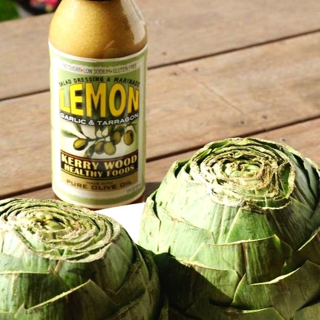 Steamed Artichoke with Kerry Wood’s Lemon, Garlic & Tarragon Dipping Sauce
Ingredients
1 Artichoke
3 tablespoons of Kerry Wood Healthy Foods "Lemon, Garlic & Tarragon"
Directions
Cut stem off artichoke, making sure the bottom is flat.
Cut 1/2 inch off the top.
Snip sharp ends off each leaf with scissors.
Steam artichoke in two inches of water for 45 minutes or until leaves are tender and can be removed easily.
Dip bottom of artichoke leaves in Kerry Wood’s Lemon, Garlic & Tarragon dressing and enjoy!