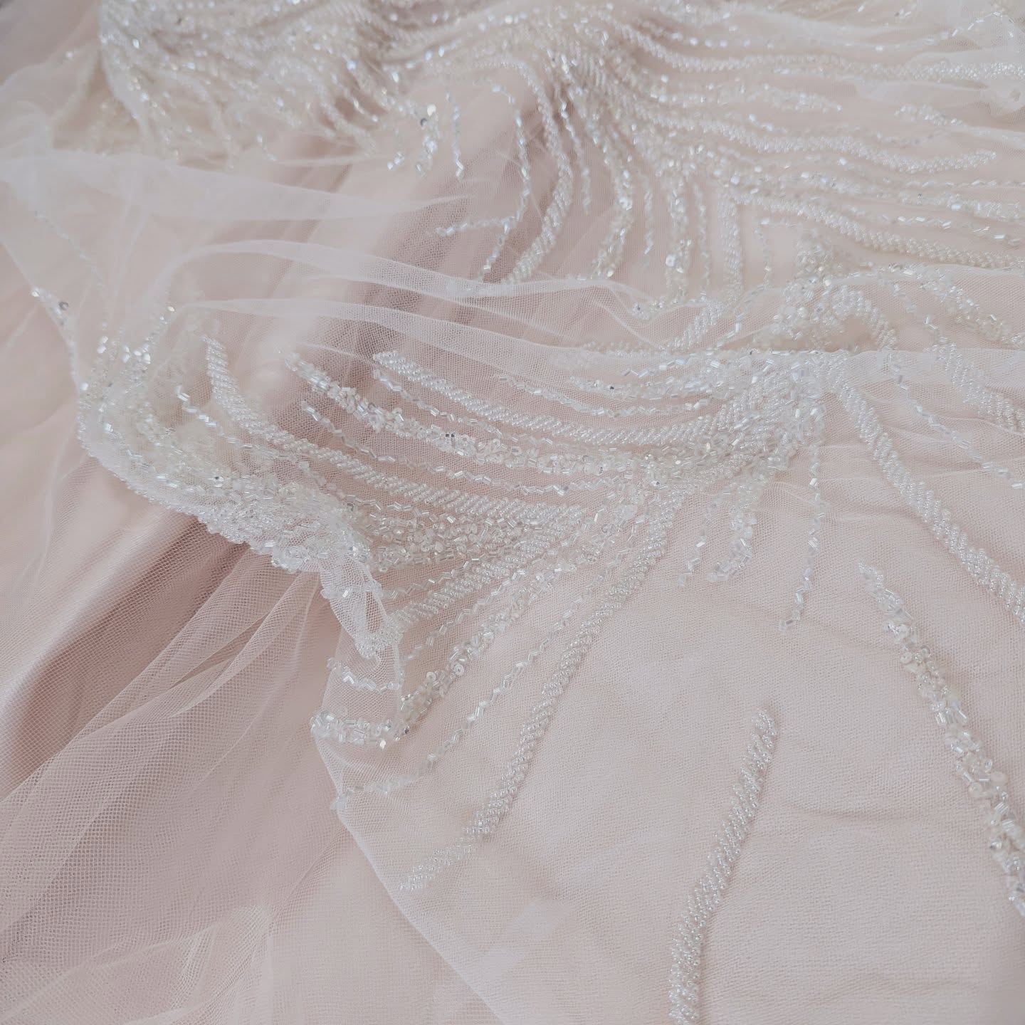 Upcycle magic, incoming ✨
This blush base + crystal beadwork combo is giving us all the modern heirloom vibes. Delicate, light-catching, and ready to become something unforgettable.
Whether it’s a bodice detail, sleeve overlay, or layered skirt — this piece is destined for a second life.
Would you wear blush on your big day?
#UpcycledBridal #CrystalBeading #SustainableStyle #LoveMeTwice #ModernHeirlooms #BlushBride #BridalInspo #pinkweddingdress #EcoChic #SlowFashionBride #ReimaginedLuxury #BeadedTulle #ConsciousDesign