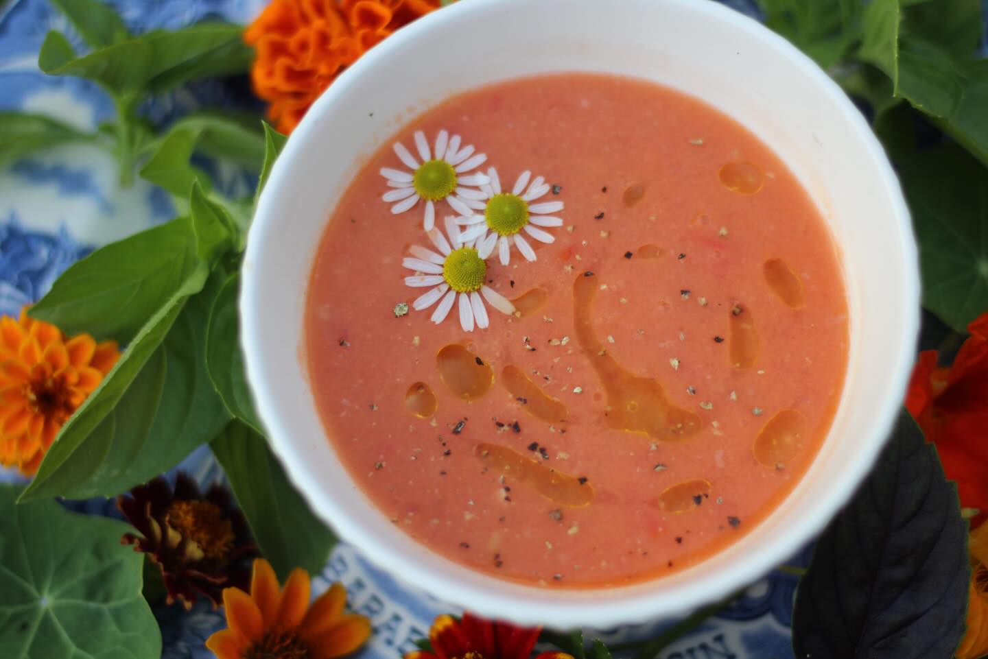 So you’re going to the farmers market this weekend, you ask yourself what you want to make while participating in tonight’s plans of chilling very hard. Maybe you need a little something to accompany some bbq’d items. Try this recipe! Guapo Gazpacho! Markets listed at the bottom.
.
6 large juicy tomatoes
2 medium cucumbers, peeled
1/4 to 1/2 of a melon or 3 ripe peaches (canteloup, water melon!)
¾ cup of cooked white beans
½ of a medium red onion
¼ cup of red wine vinegar
1 cup of water
1 tablespoon of organic cane sugar
1 teaspoon of sea salt + more to taste
¼ cup of good olive oil
A few leaves of basil for garnish
Peel and chop your cucumber, chop tomato and onion, scoop out hunks of melon/peach, and
add into your blender with every other ingredient. Don’t worry about the size of your chopped
veg, as long as it fits in the blender. Blend on high until completely smooth. A few little chunks
are okay and kind of nice as you sip this cold soup. To adjust seasoning, add more sugar, salt or
vinegar to your liking (acid, salty, sweet). Refrigerate until completely chilled (about 3 hours
minimum). This will stay fresh in your fridge for about 5 days. Garnish with fresh basil, a dash of
olive oil, and fresh cracked pepper for fun.