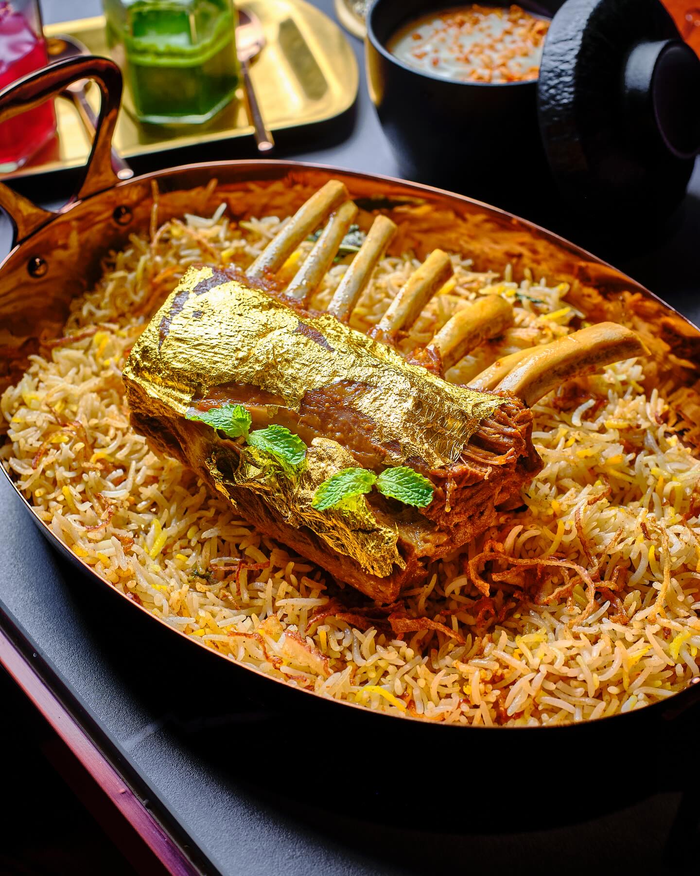 Our Signature Lamb Biryani—slow-cooked, fall-off-the-bone, and crowned with gold leaf. Because when it comes to flavour, we don’t hold back.
📍 Now open at Park Plaza Hotel, Sukhumvit Soi 18
📞 Call: 026587077
🇮🇳 From the streets of Delhi to the heart of Bangkok, our heritage has found a new home—one bite at a time. 🇹🇭
#DaryaganjBangkok #SignatureDish #LambBiryani #IndianFineDining #GoldLeafBiryani #RoyalFlavours #LuxuryDining #BiryaniLove #TandooriCraftsmanship #NorthIndianCuisine #FromDelhiToBangkok #FoodThatTellsAStory #CulinaryRoyalty #DaryaganjLegacy #StarDishMoment