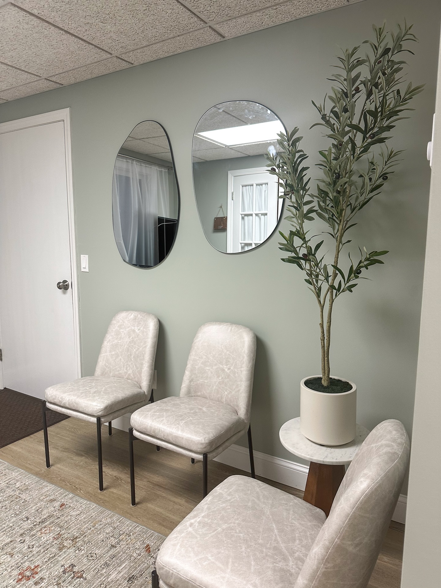 I have been dying to use asymmetric mirrors in a project, I was giddy when @mamalifeoilsandwellness was on board with using them in the Restorative Wellness Center. Stay tuned for a full reveal of the space.
.
#waitingarea #commericaldesign #interiors4all #calmvibes