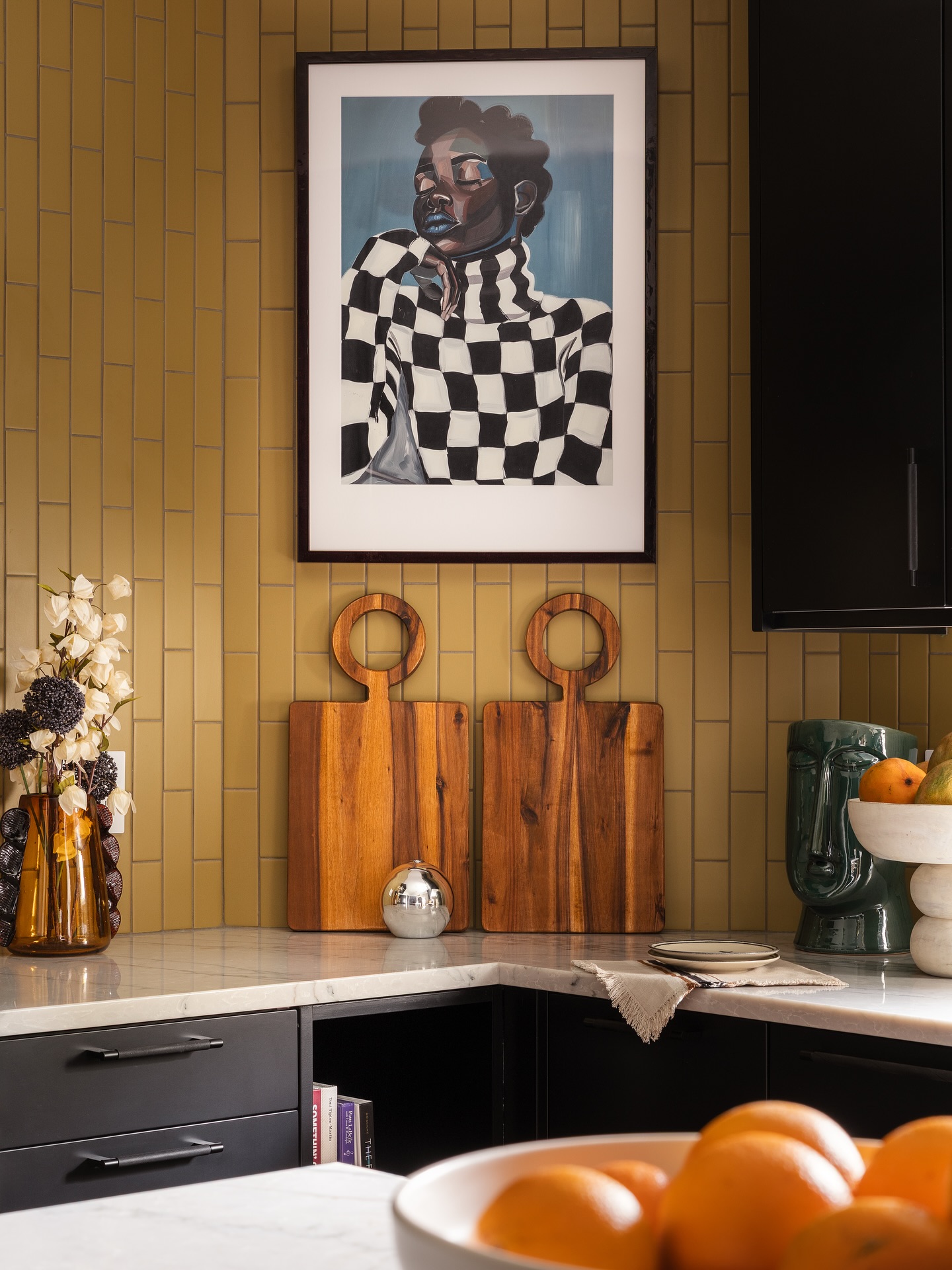 🚪 Before & After: Kitchen Transformation ✨
We took this space from dated and disconnected to bold, soulful, and fully reimagined—with the island now grounding the space as its heart.
We added black cabinetry, mustard tile, a beautiful @discoverzephyr hood, a dry bar with a Zephyr French Door Wine & Beverage Cooler, and much-needed pantry space. Layered to reflect my client’s personality. The result? A kitchen that feels modern, functional, and full of life. (And you know a statement piece of art was a must!)
Would you go bold in your kitchen? And can you believe the kitchen before, this is when my client first bought it?! 👇🏽
Photographer: @mikevantassell
#KitchenDesign #ModernEclectic #KitchenTransformation #BeforeAndAfter #InteriorDesign #DesignDetails #bethdianasmith