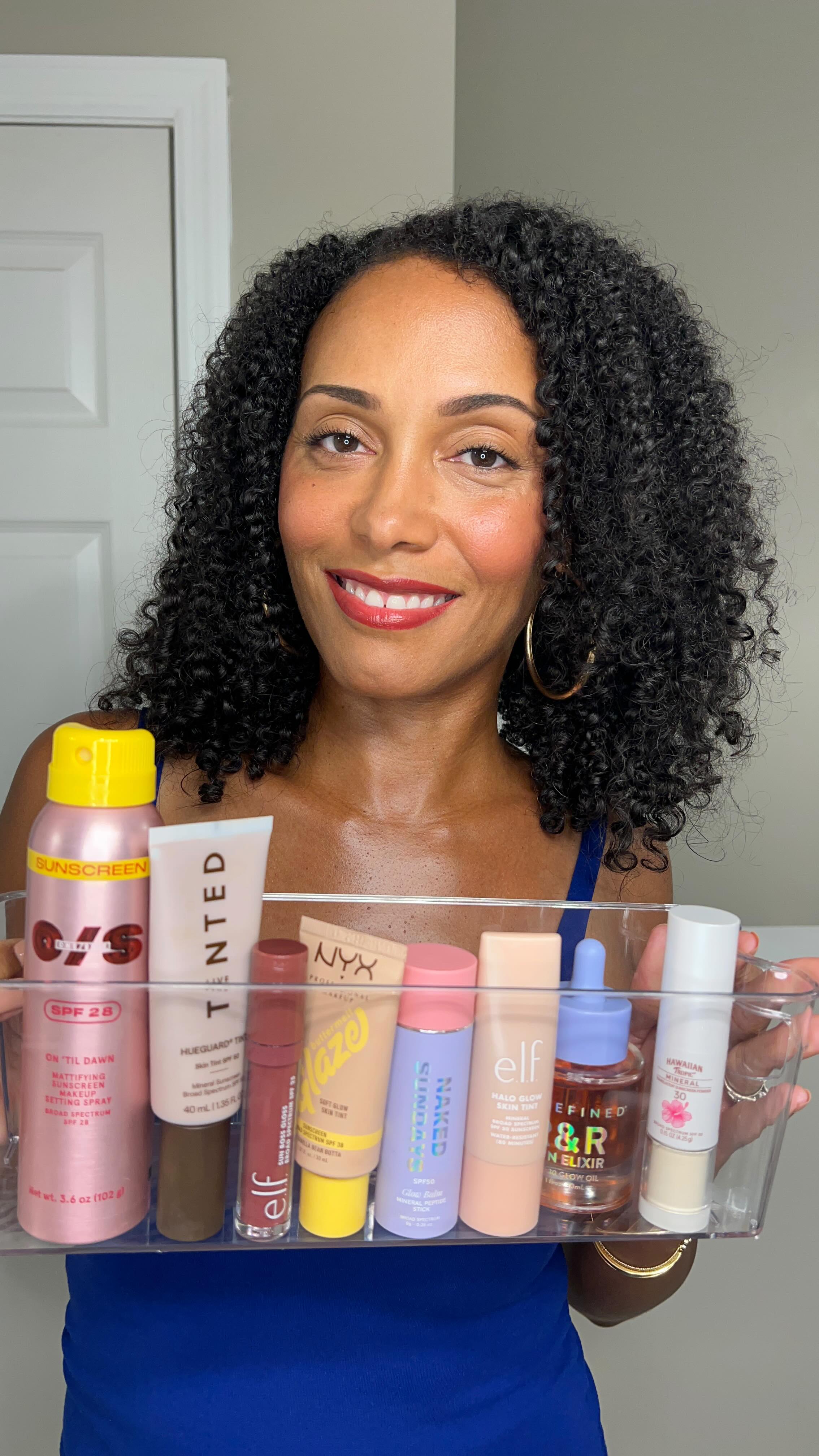 Give me Soft Glam using SPF Makeup all day everyday! 💅 I’m really enjoying this new skincare + sun protection journey that I’m on. ☀️
Products I’m using right now:
Foundation: Live Tinted 
Hueguard Tint - Shade 05
SPF 50
@livetinted 
Setting Powder: Hawaiian Tropic 
Transparent Sunscreen Powder 
SPF 30
@hawaiiantropic 
Contour: e.l.f. Cosmetics 
Halo Glow Skin Tint - Shade: 18 Rich Neutral
SPF 50
@elfcosmetics 
Highlight: NYX Cosmetics 
Buttermelt Glaze - Shade: 02 Vanilla Bean Butta
SPF 30
@nyxcosmetics 
Blush: Naked Sundays 
Glow Balm - Shade: Pink Pop 
SPF 50
@naked_sundays 
Lip Gloss: e.l.f. Cosmetics 
Sun Boss Gloss - Shade: That’s My Jam
SPF 25
Setting Spray: One/Size
On ‘Til Dawn Sunscreen
SPF 28
@onesize 
Body Oil: Undefined Beauty
R&R Sun Elixir Glow Oil
SPF 30
@undefinedbeauty_co 
Have you tried any of these? What are your thoughts? 
.
.
.
#Sunscreen #Skincare #Sunprotection #SPF #SPFMakeup #Makeup #MakeupRoutine #CurlyGirl #NaturalHair #LiveTinted #OneSize #ElfCosmetics #NakedSundays #UndefinedBeauty #HawaiianTropic #BeautyProducts #SoftGlam #ContentCreator #NashvilleContentCreator #NashvilleInfluencer
