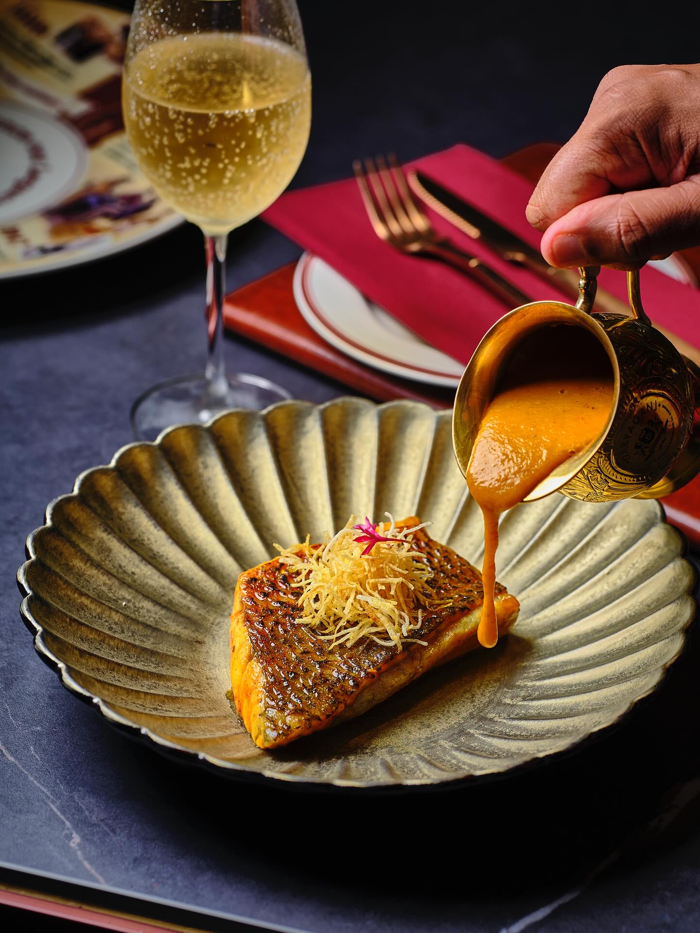 Char-grilled Seabass, crisp on the outside and buttery inside — poured over with rich makhani curry tableside. Finished with fried potato threads for crunch and balance. A modern Gold Menu signature that proves simplicity, when done right, is unforgettable.
📍 Now open at Park Plaza Hotel, Sukhumvit Soi 18
📞 Call: 026587077
🇮🇳 From the streets of Delhi to the heart of Bangkok, our heritage has found a new home—one bite at a time. 🇹🇭
#DaryaganjBangkok #SalmonTikka #GoldMenuOnlyInBangkok #ModernIndianFood #GrilledSalmon #TablesidePour #TandoorToTable #MakhaniSauce #SeafoodLovers #NorthIndianFlavors #BangkokRestaurants #SpiceAndElegance #IndianFineDining #FoodArtistry #BangkokEats