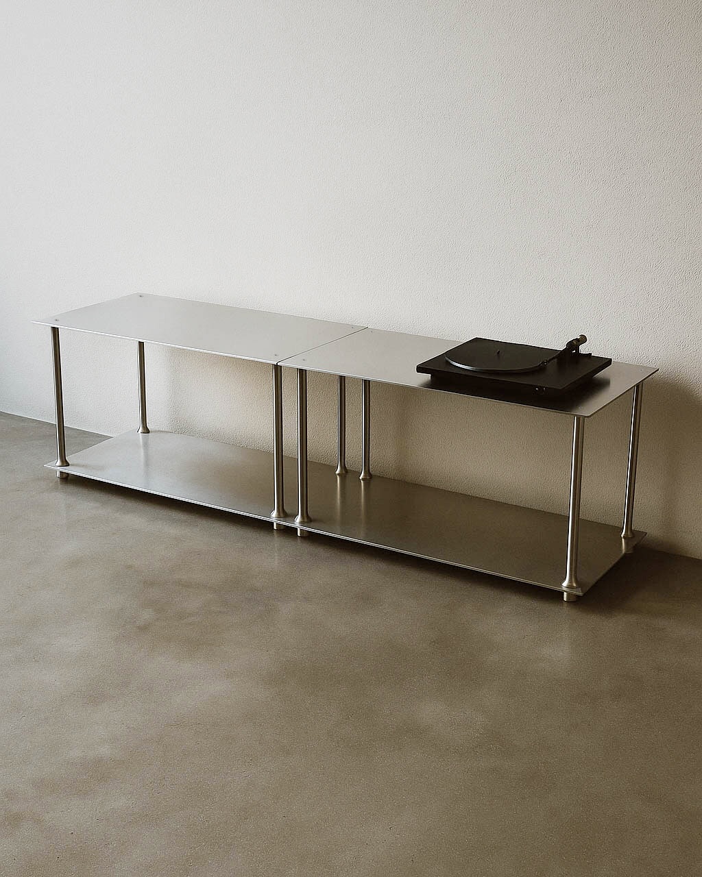 Stainless steel flat packable console table. 400mm x 400mm x 800mm per module.