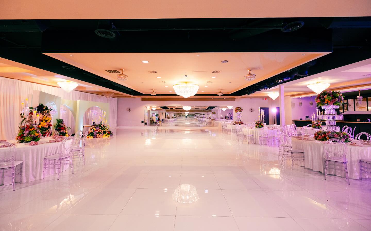 Here is our Grand Ballroom featuring stunning white seamless floors. Current Capacity for 250 guest