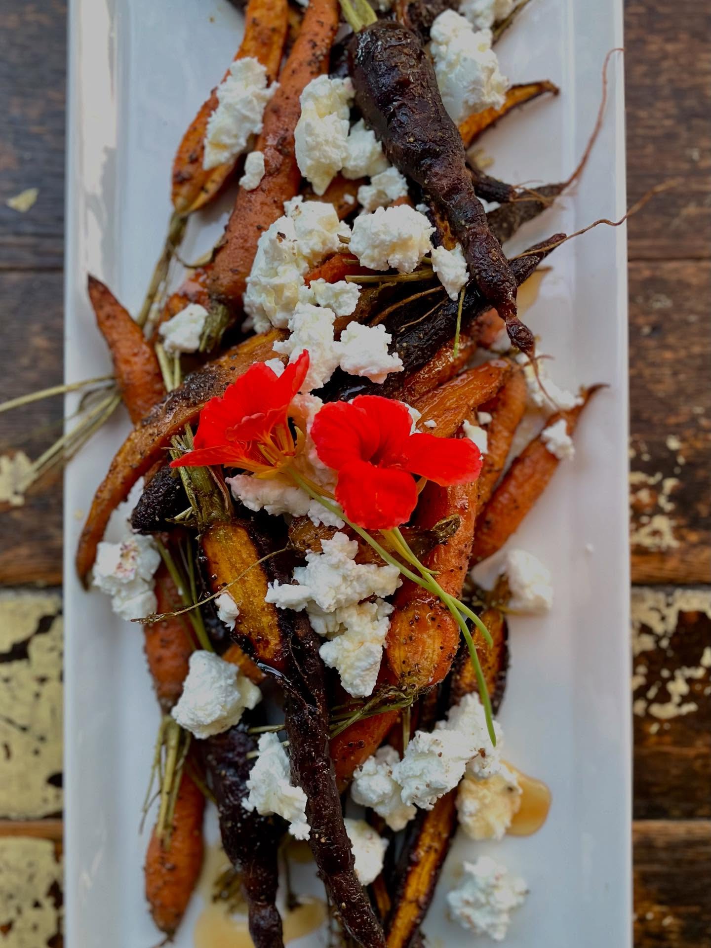 Cumin Roasted Heirloom Carrots. @sunflowerfarmcreamery Chèvre. Our own Hot Honey. #0miles
