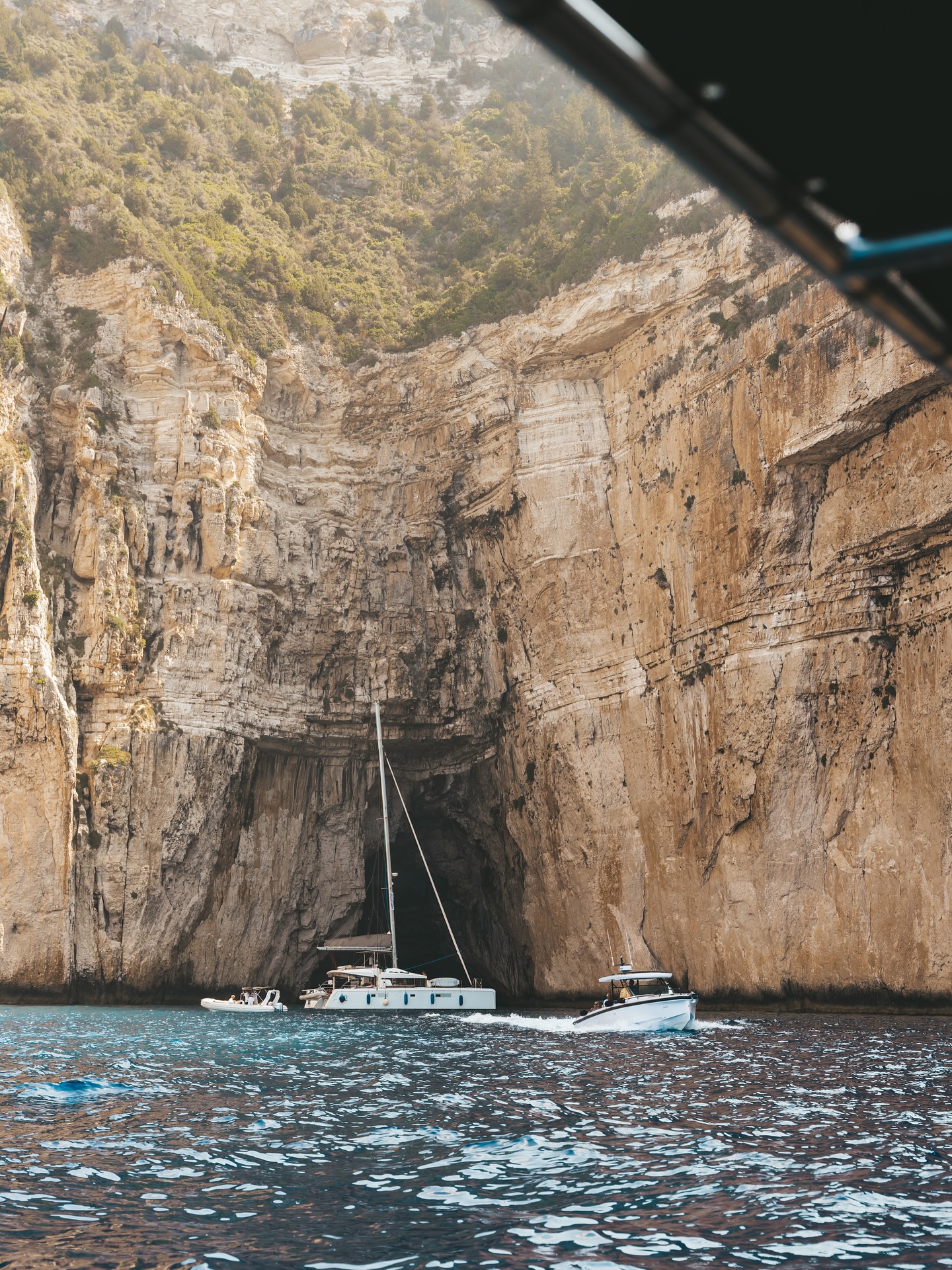 The Blue Caves:
A highlight of any trip to Paxos is a visit to the Blue Caves on the island’s west coast.
Your boat will be able to navigate into the stunning sea caves, where sunlight refracts through the water, creating a dazzling, ethereal blue glow.
www.filakasboats.com