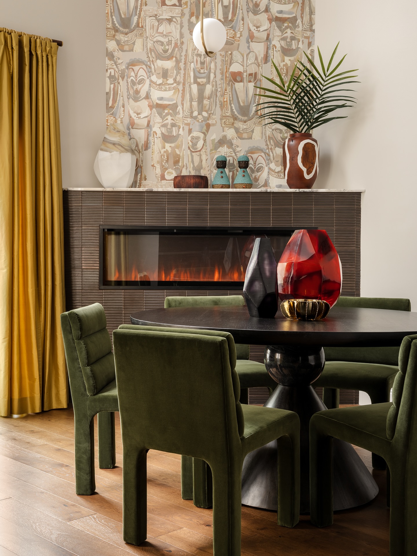 🚪 Before & After: Dining Room Transformation ✨
This is the same home with the black and mustard kitchen and the sultry bedroom with the vaulted, wallpapered ceiling that I shared recently. Each space was designed to be distinct, but together they create a cohesive story.
New wood flooring lays the foundation, while the fireplace was reinvented—tiled in bronze, topped with quartzite, and fitted with an electric fireplace insert for both style and function. The showstopper? The 13-foot wall above the fireplace is wallpapered in Moko, a collaboration between @badguild and @s.harris.home that I had the pleasure of working on. The wallpaper was being discontinued, so I ordered the last few rolls in mid-2023 and held onto them until the site was ready because my client and I both knew it was the one.
The result is a dining space layered with warmth, texture, and artistry. Designed to set the tone for unforgettable meals and gatherings… and a romantic meal or two. 👀
The lesson? If you love it, buy it and save it. ✍🏽
Photographer: @MikeVanTassell
#DiningRoomDesign #BeforeAndAfter #InteriorDesign #BethDianaSmith #BADGuild #SHarris