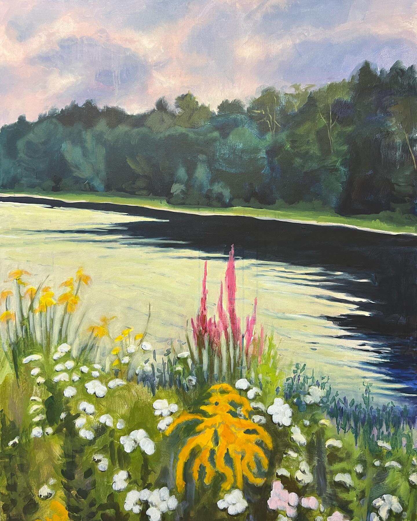 Stormy skies ahead, but peaceful and beautiful for the moment at the edge of the lake.  Wild flowers always seem to flourish!