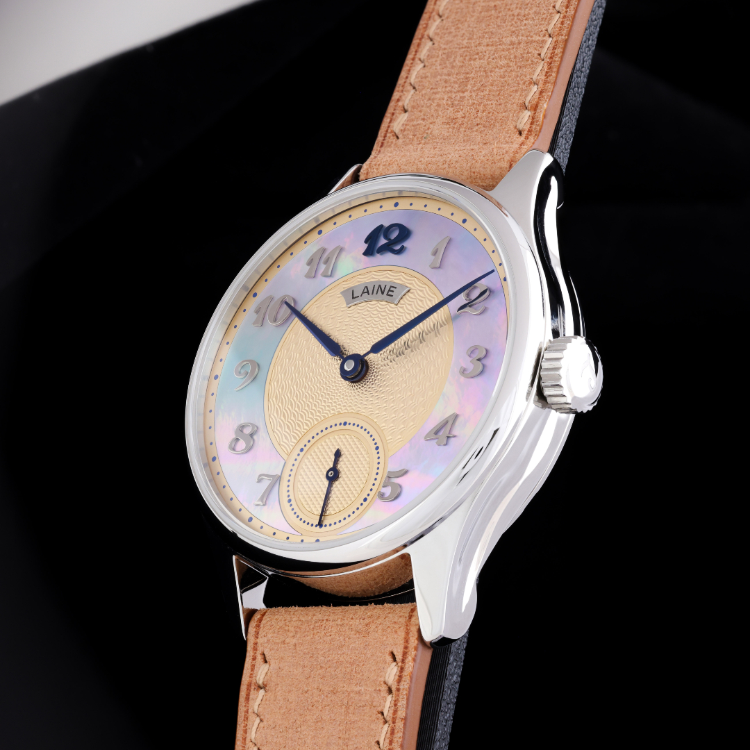 Pearl by day, rainbow by light. Why settle for one shade, when your seconds can shimmer in many?🌊🦪
Laine GG with rainbow MoP outer dial and double guilloche on center.
#custommade #bespoke #guilloche #torstilaine #watchfam #lainewatches #watch #microrotor #swisswatches