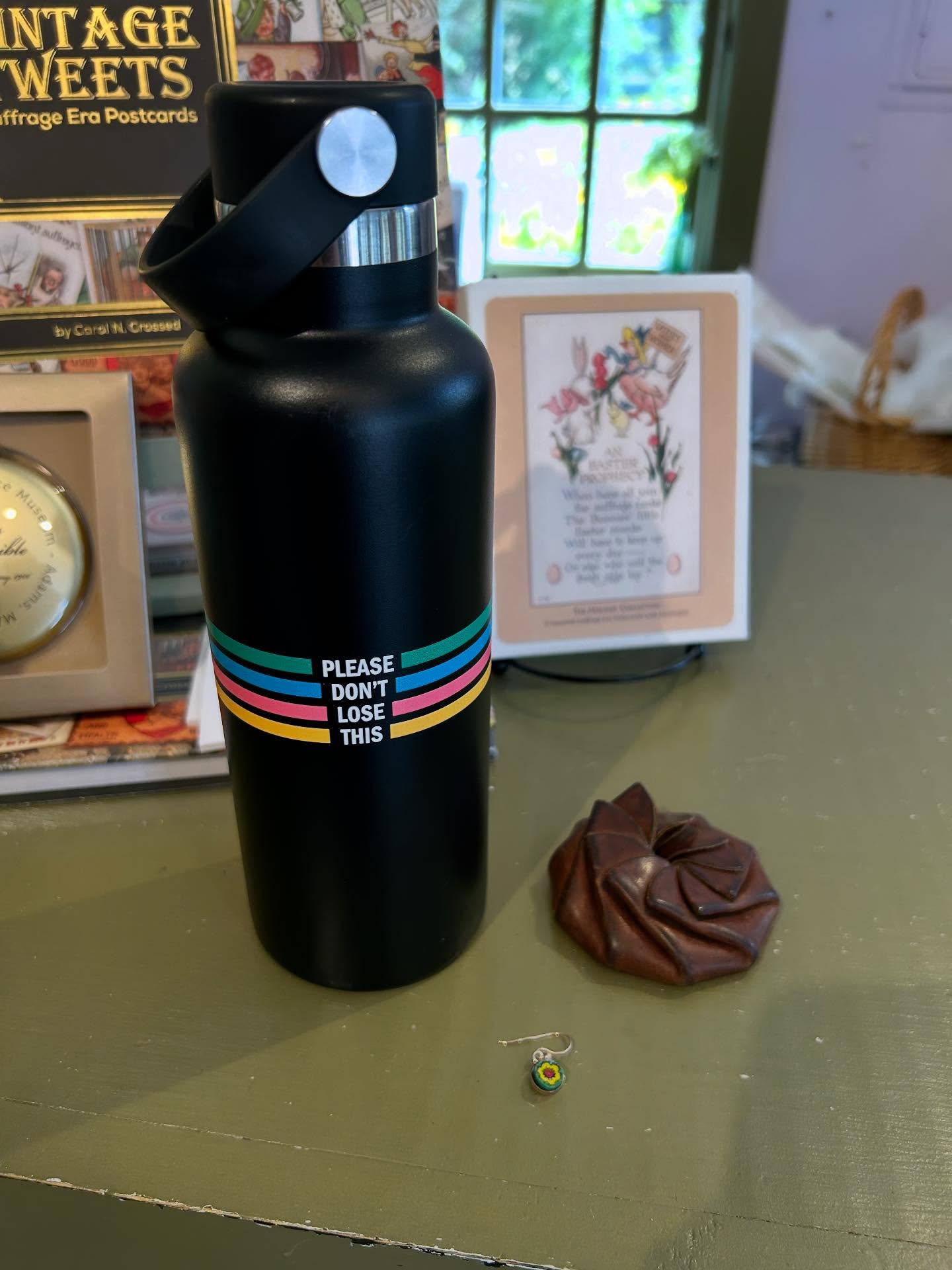 Did you leave something at the museum? This water bottle inscribed with “Please Don’t Lose This” was left here yesterday, and a coin purse, and a lone flower earring were left earlier this month! #lost #lostandfound #museum #museumshop