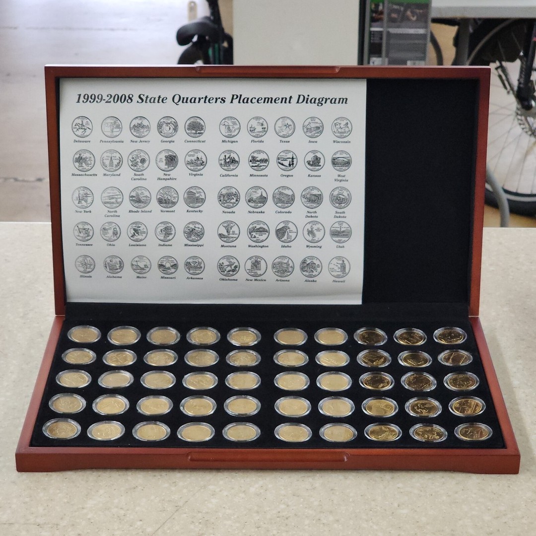 Discover the beauty of all 50 states with this gold-plated quarter set from 1999-2008, housed in a cherrywood style case. Perfect for collectors and history buffs alike! ๐บ๐ธโจ #CoinCollector #StateQuarters #GoldPlated #Numismatics #Uncirculated #Goldplated
https://ebay.us/m/spLXxP