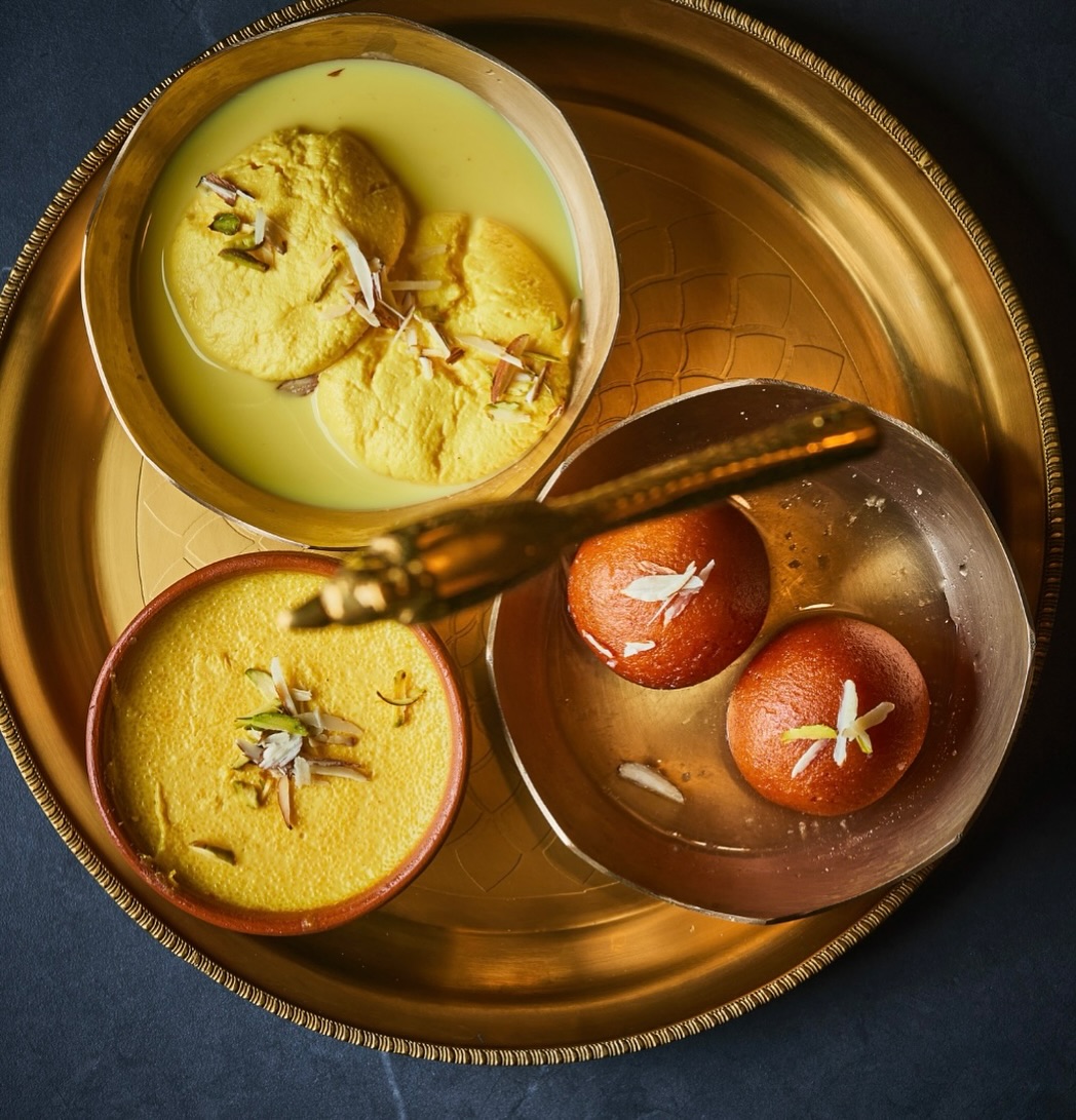 From soft, syrup-soaked Gulab Jamun to chilled Rasmalai and saffron-scented Phirni, our dessert platter brings comfort, nostalgia, and just the right amount of indulgence. Made fresh, served warm (or cold), and always with love.
📍 Now open at Park Plaza Hotel, Sukhumvit Soi 18
📞 Call: 026587077
🇮🇳 From the streets of Delhi to the heart of Bangkok, our heritage has found a new home—one bite at a time. 🇹🇭
#DaryaganjBangkok #IndianDesserts #SweetEndings #GulabJamun #Rasmalai #BhappaDoi #NorthIndianSweets #DessertPlatter #ModernIndianFood #TandoorToTable #BangkokRestaurants #SugarAndSpice #SaffronLove #FoodWithSoul #FromDelhiWithLove