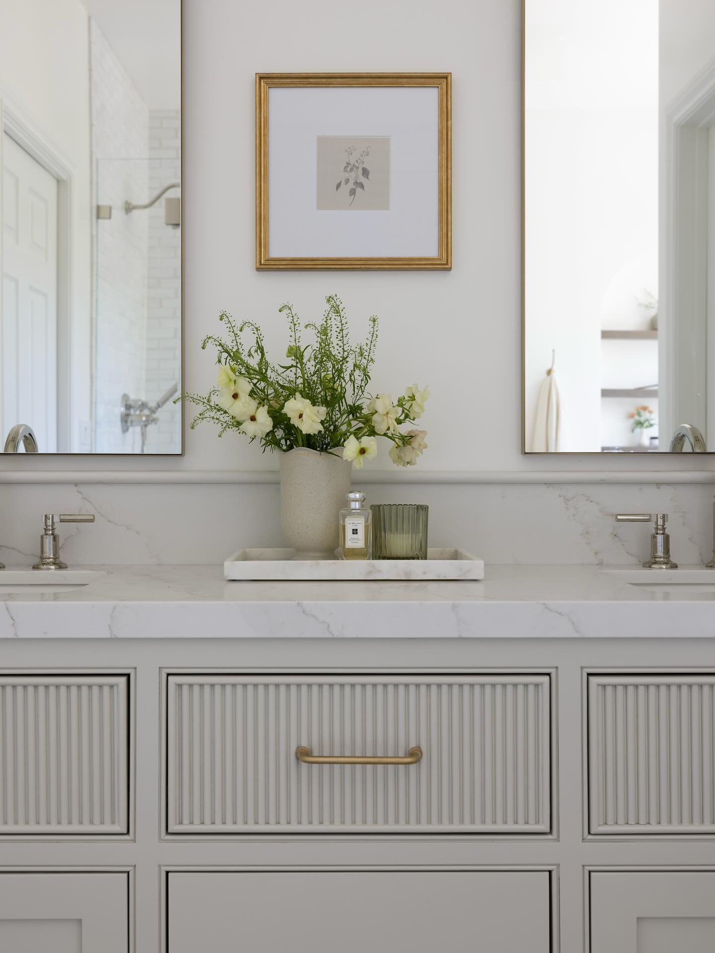 This one has my heart. 🤍
My first photoshoot under @sarahdiazdesign
I wanted this bathroom to feel like the ultimate retreat with soft cabinetry, warm brass accents, subtle veins on the counters and a light filled shower and tub that practically begs you to slow down.
Every detail was chosen with care, all coming together for a timeless, elevated look. Feeling so proud and so grateful for clients who trust me to bring spaces like this to life! ✨
📷 @jessicabrydsonphotography
#primarybathroom #bathroomdesign #homedesign #interiors #interiordesign #bathroominspo #bathroomgoals #sddprojectreveal #everydetailmatters #justinbieber #iykyk
