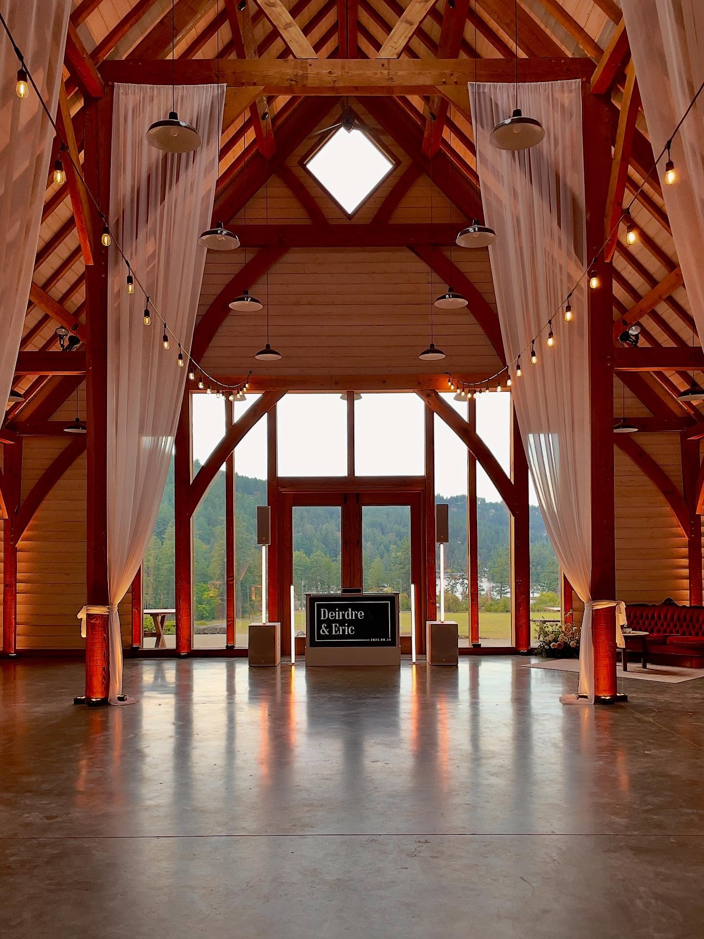 Check out this stunner of a wedding I DJ’d at a 300 acre farm, nestled in the Cowichan Valley, owned by the groom’s family. With a ceremony beside the water, dinner in an open field, and dancing in the barn, there was truly nothing left to be desired!
I provided a portable self-powered PA system with microphones for the ceremony, a PA speaker outside the barn for cocktail hour music, and another self-powered speaker and mic for dinner music and speeches in the field.
My DJ setup featured my custom white booth, white sound system, and uplighting in a warm candlelight white to highlight the beautifully rustic hand cut timber framing in the barn.
Venue, Bar, Pizza: @birdseyecovefarm
Planner: @bluelilyevents
Food: @truffles_catering
DJ, Sound, Lighting: @djchrispoynter
Cake: @butterbloom_vic
Florals: @nightsongfarm
Photographer: @sachinkhona
Videographer: @tanner_biggan
Makeup: @rachelpattersonmakeup
Hair: @hairdesignbyjess
Decor: @tabletopcuratedrentals, @partymood