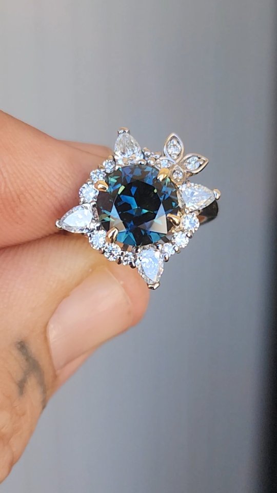 We designed and created this incredible 18k white and yellow gold Engagement Ring for our amazing clients to represent their beautiful love story.
Featuring a natural 3ct Australian Pharaohs eye parti with a complex mixture of blue teal colours that are enriched by a natural yellow centre. Complimented with an unquie butterfly feature incorperated amongst a pear and round cut white diamond halo!
To view our collection of sapphires and Bespoke Jewellery - DM, email sales@thehouseoffacets.com.au or book a Viewing Consultation via website - link in bio.
#australiansapphire #partisapphire #sapphirering #rubyvale #engagementring #bespokering #australiansapphire #jewellerydesigns #australianjeweller #australianjewellery #australianjewellerydesigner #sydneyjeweller #melbournejeweller #brisbanejeweller #naturalbeauty #ringsofinstagram #unheatedsapphire #oneofakind
#finejewelry #handmadejewellery