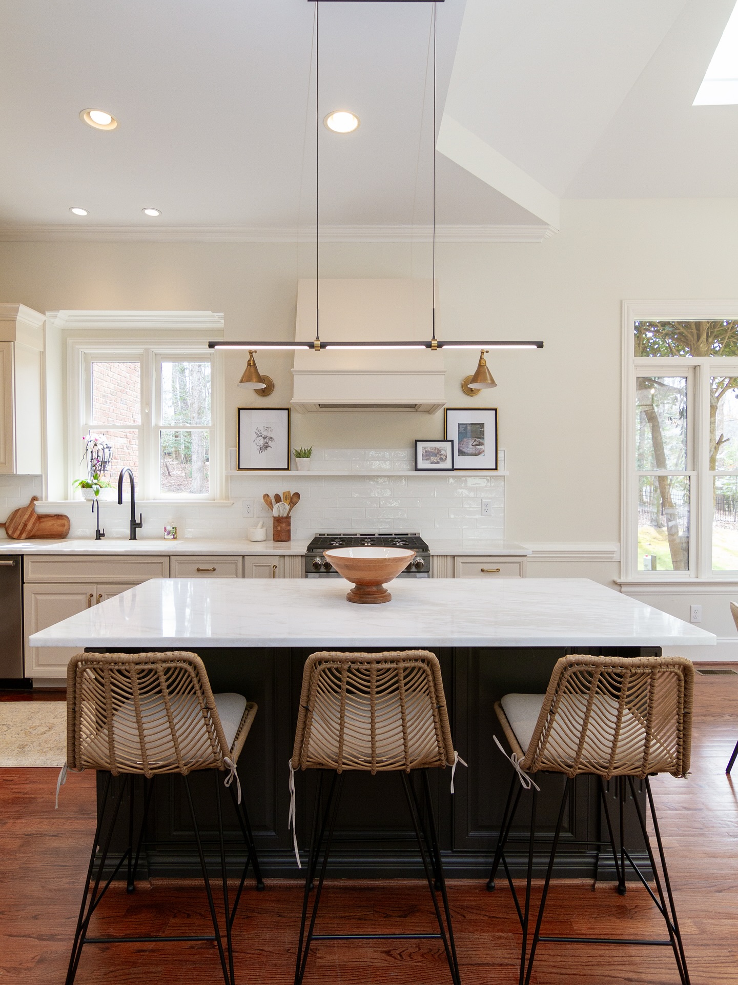 Swipe for a good before and after!
Our client said she felt claustrophobic in her kitchen despite the 10 foot ceilings and open concept.
So we lightened everything up with beautiful marble countertops, lightly textured backsplash, fresh paint, and my favorite— custom hood. Pulling the bulky range hood down made an immediate impact.
Ready for your custom kitchen? Schedule your free design consult today!