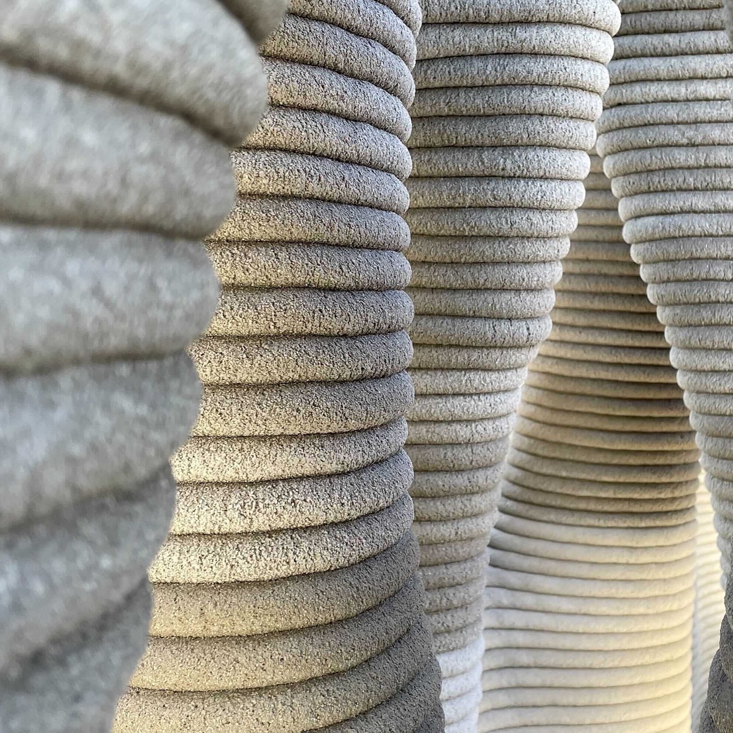 ICON have been 3D printing structures for a while now but they are now developing a next-gen multi-story robot which will change the way we build.
Recently they partnered with Michael Hsu Office of Architecture @hsuoffice to bring a 2 storey affordable homes to Austin, Texas. They are built on site in around 24 hours using their pioneering large-scale 3D printing,
Another project in the works in the worlds first 3D printed hotel being built in the Texas desert designed by @big_builds. The printed ‘filament’ is an extruded mix of their cementious material combined with local sand, soil, and subtle pigments that mirror the terrain. Achieving a lavacrete cement-like, low-carbon, strong material that its tuned to the landscape and its humidity and heat.
Due the printing process the designs ends up blending traditional architecture forms as well as organic & seamless.
@icon3dtech
#3dprint #3dprintedarchitecture #materialinnovation #architecture #architecturalmaterials #lowcarbon