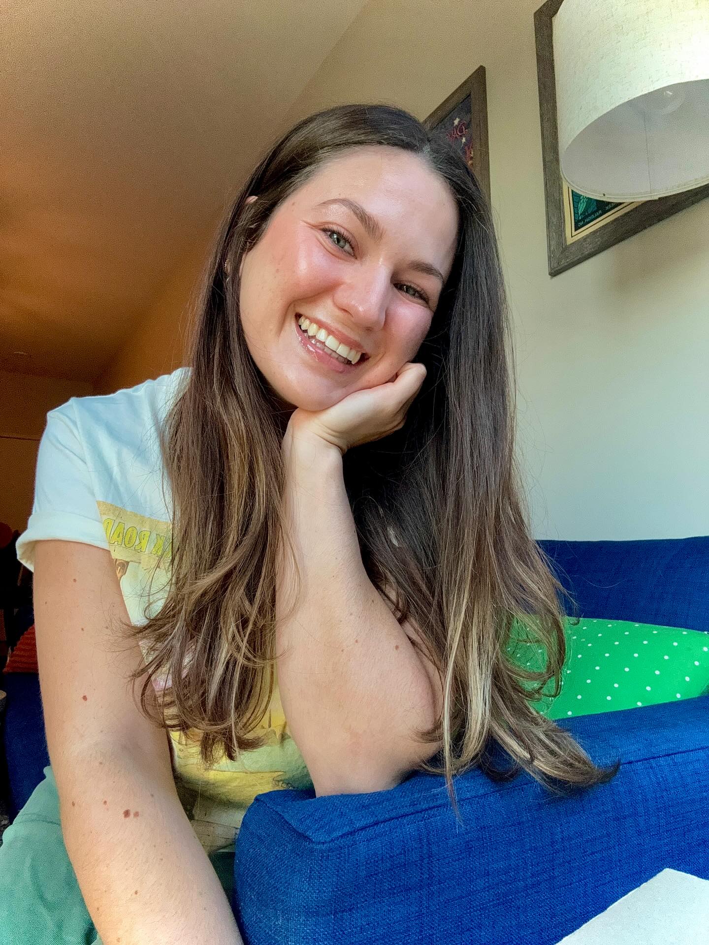 sitting on the couch 🛋️💙📚🌿