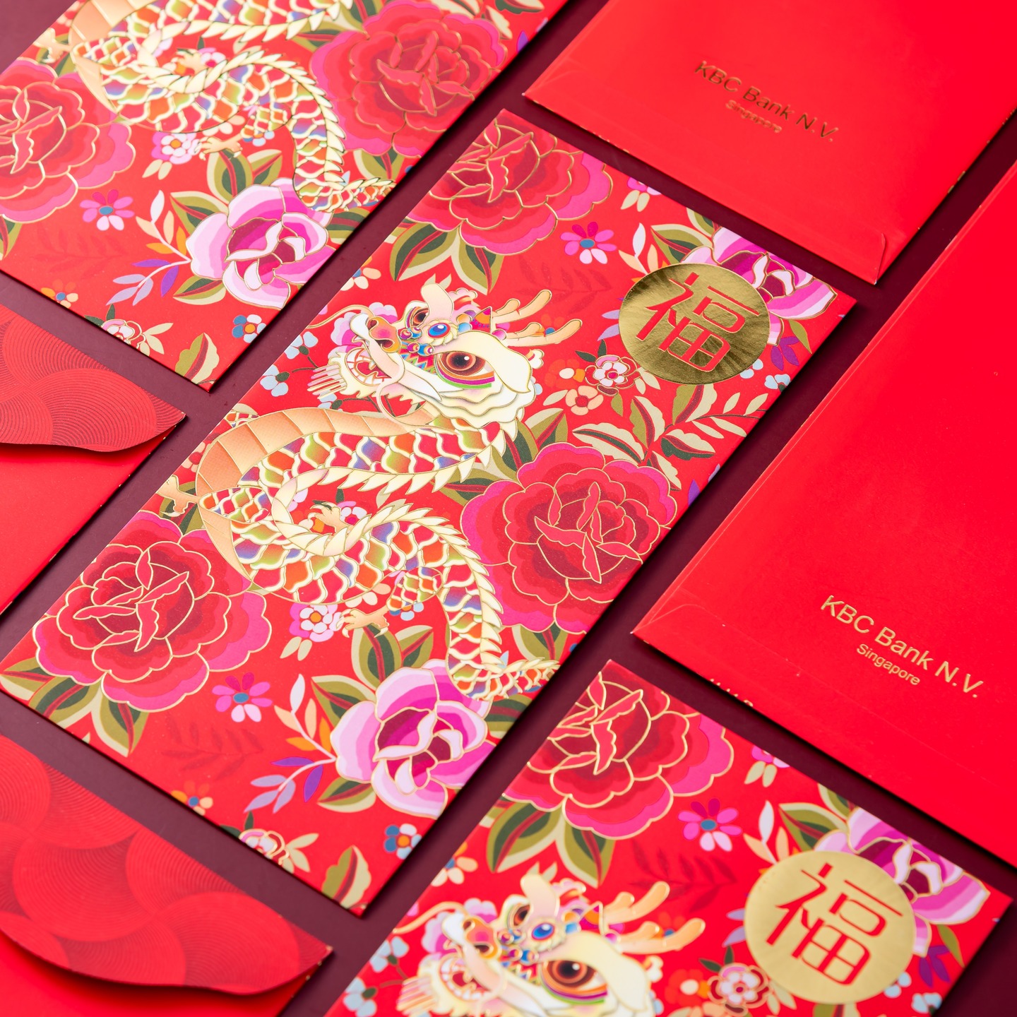 Welcoming the Lunar New Year with vibrant celebration. This red packet for KBC Bank feature a lively dragon dancing among bold peony blooms, symbolising prosperity, vitality, and good fortune. Finished with gleaming gold details and the auspicious “福”, the design carries wishes of abundance and joy into the year ahead. Minimal yet striking — Porsche’s Lunar New Year red packets feature sleek linework illustrations paired with bold colours. The refined design reflects elegance, precision, and modernity, carrying festive wishes of prosperity and success into the year ahead.
#kbcsingapore #kbcbank #redpacketdesign #redpacket #redpackets #lunarnewyear #chinesenewyear #festivepack #artistryinculture #singapore #packagingpremium #angpao #angpau #hongbao #angbao #redpacketprinting #redpacketprintingsingapore #redpacketprintingmalaysia #customisedredpacket #customisedredpackets