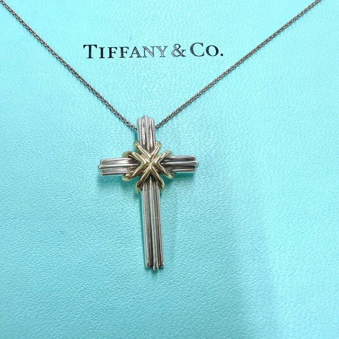 Only $275. A Tiffany & Co. two-tone sterling silver and 18K Yellow Gold cross necklace. Perfect for any special occasion or everyday elegance. 16" round link chain with a classic spring ring closure. #TiffanyAndCo #SterlingSilver #CrossNecklace #JewelryLovers ๐โจ
https://ebay.us/m/g0m5bo
