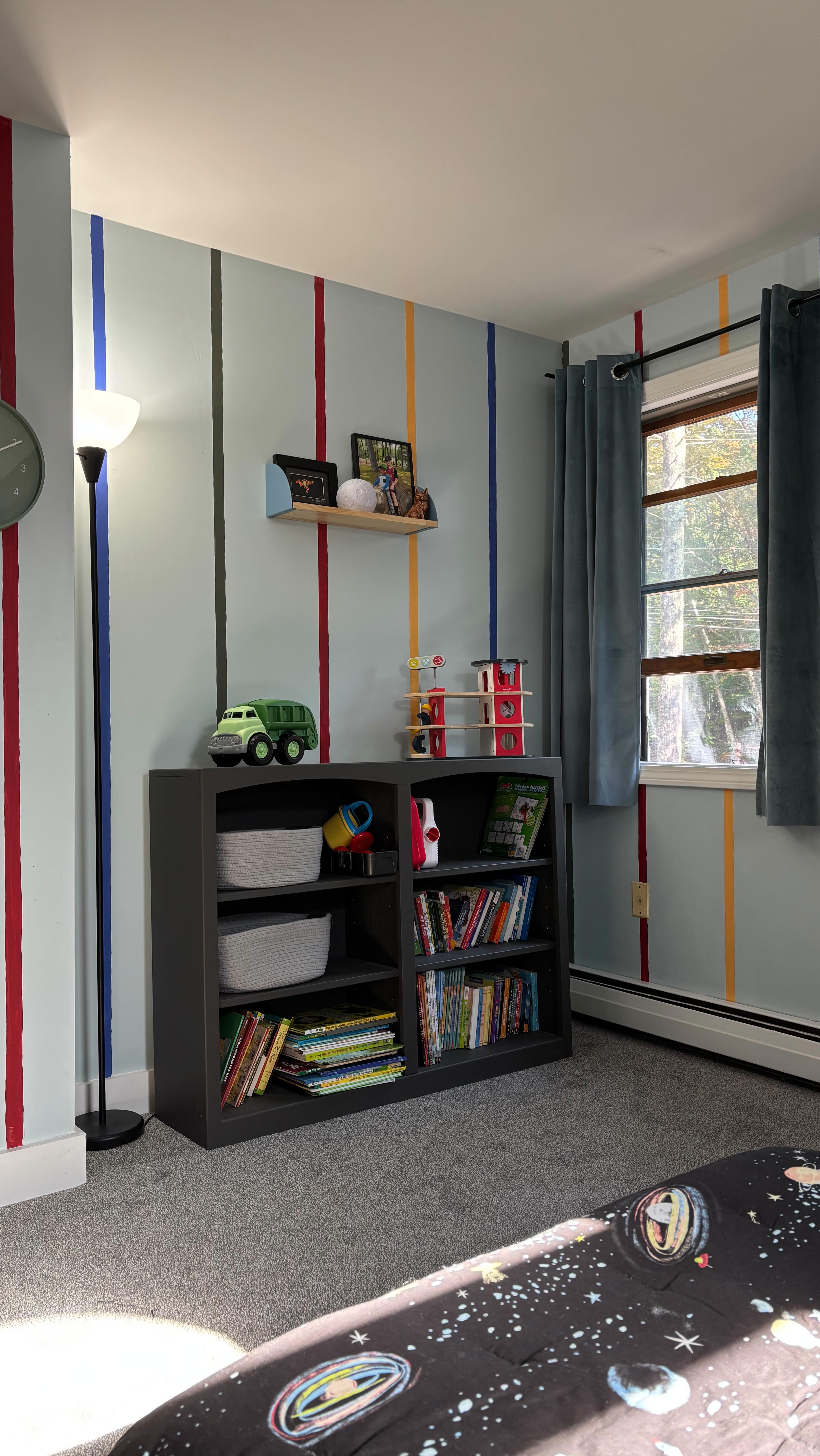 My toddler boy’s room makeover is complete! When we moved in I thought I’d make it easy on myself to keep the wall color as is and add some fun stripes for the feature. It IS fun but it wasn’t necessarily easy.
We all love how colorful and happy this room is now. Definitely worth the time for the end result!
#interiordesignlovers #edesigner #boysroom #stripesonstripes #diypainting #circustheme #kidsbedroom #paintingproject #interiordecorators #interiordesignersofinstagram #nhseacoastinteriordesigner