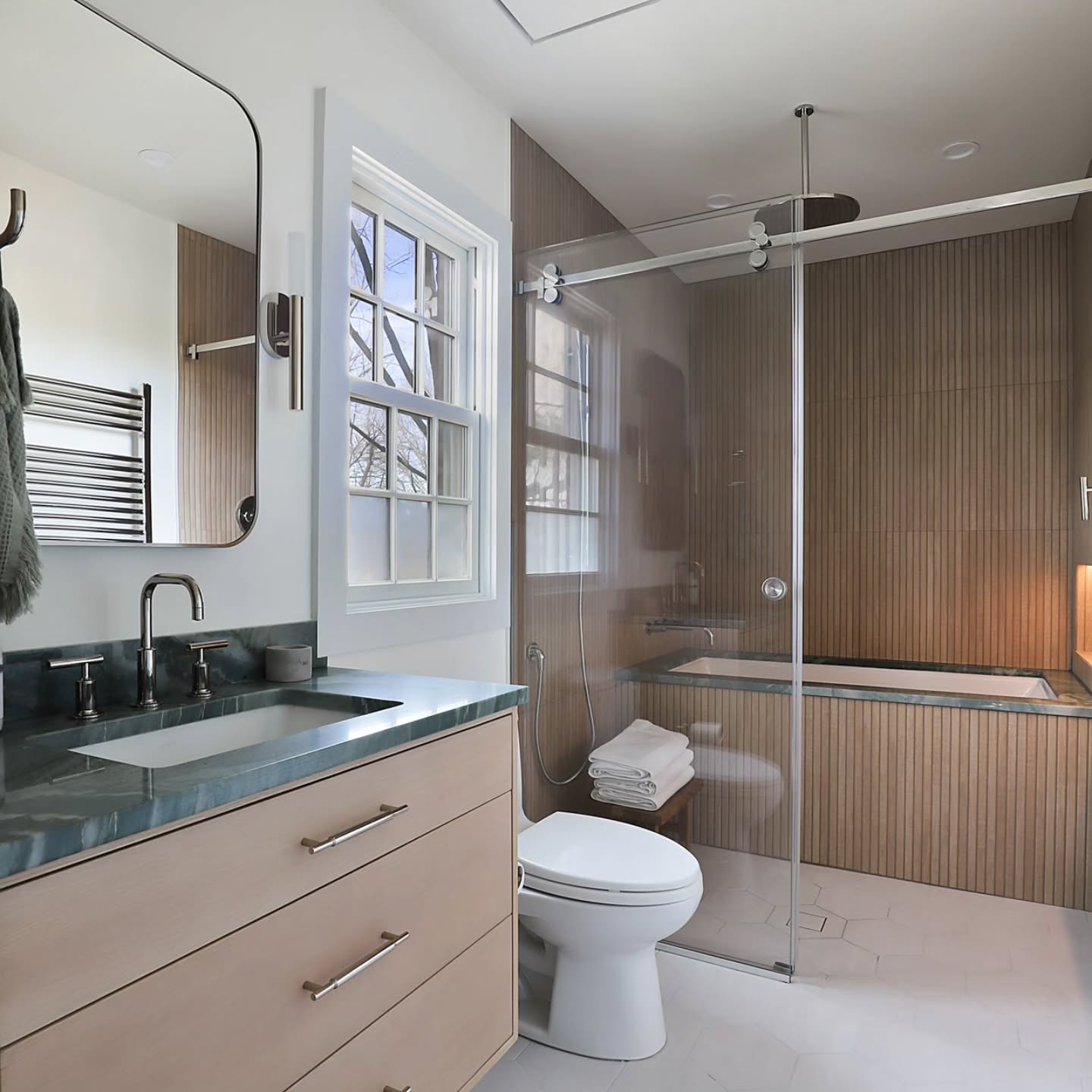 This bathroom had zero storage, a tiny shower, and a separate tub that didnāt work. We transformed it into one spacious wet room with a deep soaking tub + shower, a custom oak vanity designed to fit perfectly, and smart storage with a tower + recessed medicine cabinet. A zero-entry shower with continuous floor tile makes the space feel larger, while green marble + warm wood tones create a natural ambiance that ties it all together.
Custom design = no wasted space + endless possibilities.
š·@dannycooney
#LuxuryInteriors #CustomDesign #DesignBuild #WestchesterHomes #TimelessDesign #LuxuryBathroom #BathroomInspo #InteriorDesignGoals #HomeRenovation #CustomMillwork #InteriorDesignWestchester #RenovationGoals #DesignDetails ##bathroomrenovation #bathroomdesign #luxuryliving #housedesign
