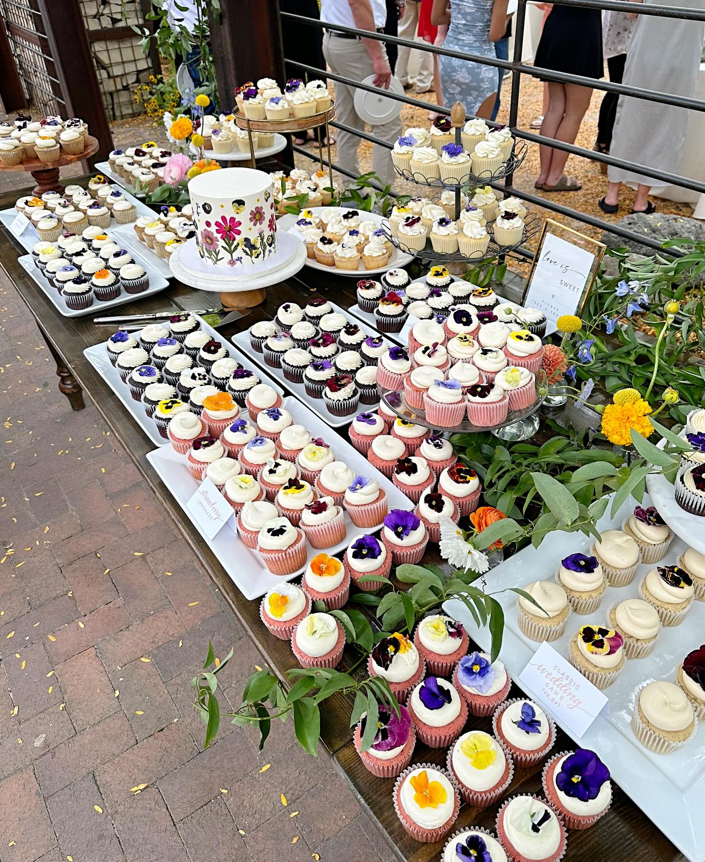 Edible flowers make for the prettiest summertime displays🌸
We made this floral cake and cupcake display for a wedding at the @idahobotanicalgarden last year, and I am still obsessed. We made the cupcakes in a variety of decadent flavors and topped them with edible florals for a colorful display that was sure to please every guest🧁
The cake was in our classic wedding cake combination, which is a moist almond cake, with raspberry compote filling, and vanilla Italian meringue buttercream. The cupcakes were made in the following flavors:
— Almond cake, with raspberry compote filling, and vanilla Italian meringue buttercream
— Strawberry cake, with lemon curd and fresh strawberries filling, and lemon Italian meringue buttercream
— Banana cake, with dulce de leche and caramelized bananas filling, and caramel Italian meringue buttercream
— Chocolate cake, with chocolate mousse filling, and white chocolate Italian meringue buttercream
— Gluten free and Vegan chocolate cake, with vegan salted caramel filling, and vegan vanilla buttercream
— Gluten free and Vegan almond cake, raspberry compote filling, and vegan vanilla buttercream
So many incredible options!🤤
#edibleflowercake #pressedflowercake #weddingcupcakes #floralwedding #floralweddingcakes #floralcupcake #edibleflowercupcakes #boiseweddings #idahowedding #colorfulweddings #boisebaker #boisecakes #boisecustomcakes #boiseweddingcakes #boisebakery